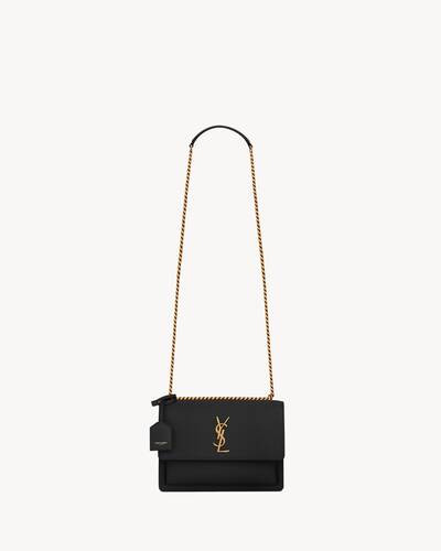 Saint Laurent monogram bag with front flap, featuring side gussets, chain and leather shoulder st... | Saint Laurent Inc. (Global)