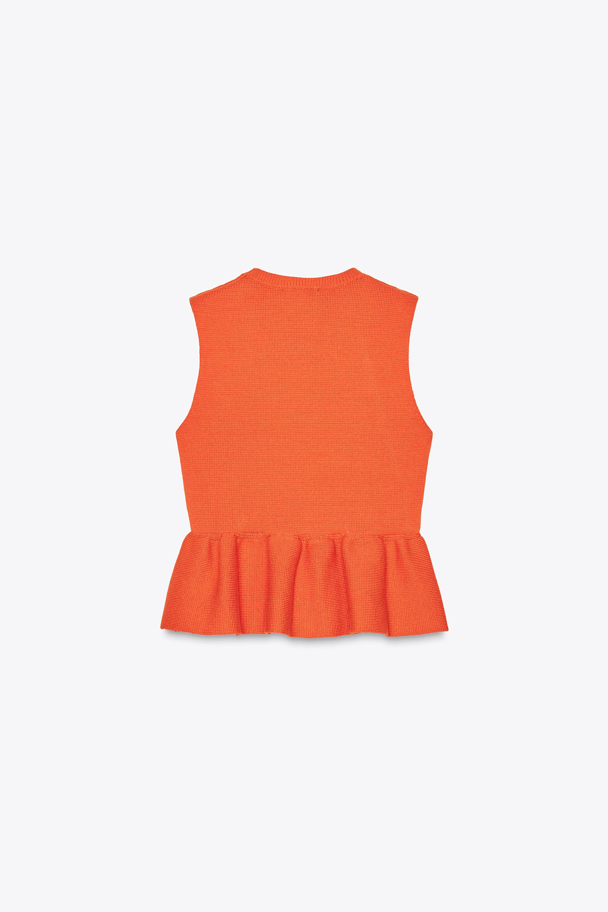 Sleeveless round neck top. Flared hem. | Zara UK