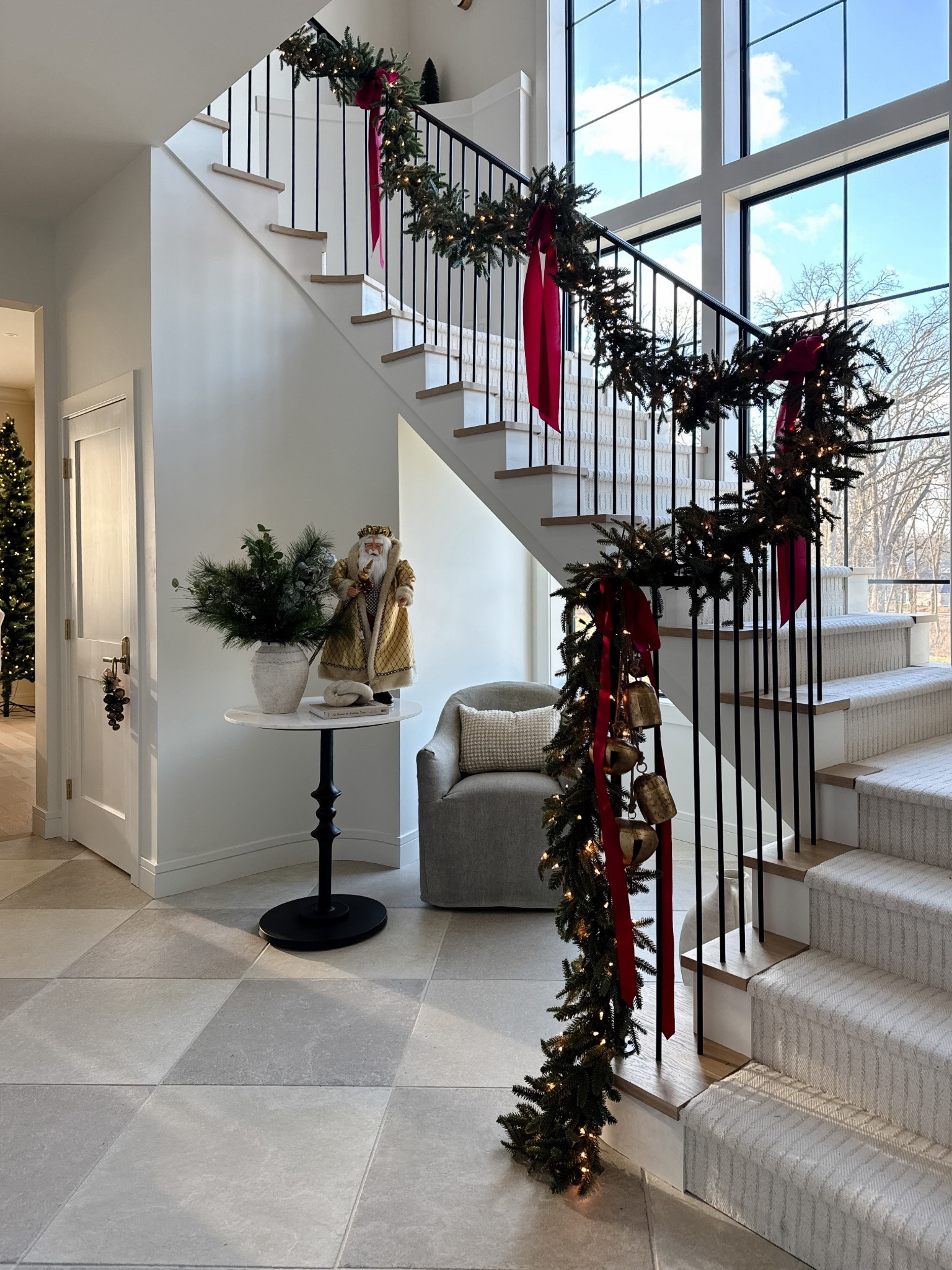 Christmas garland with bows and bells 

#LTKHoliday #LTKHome #LTKSeasonal