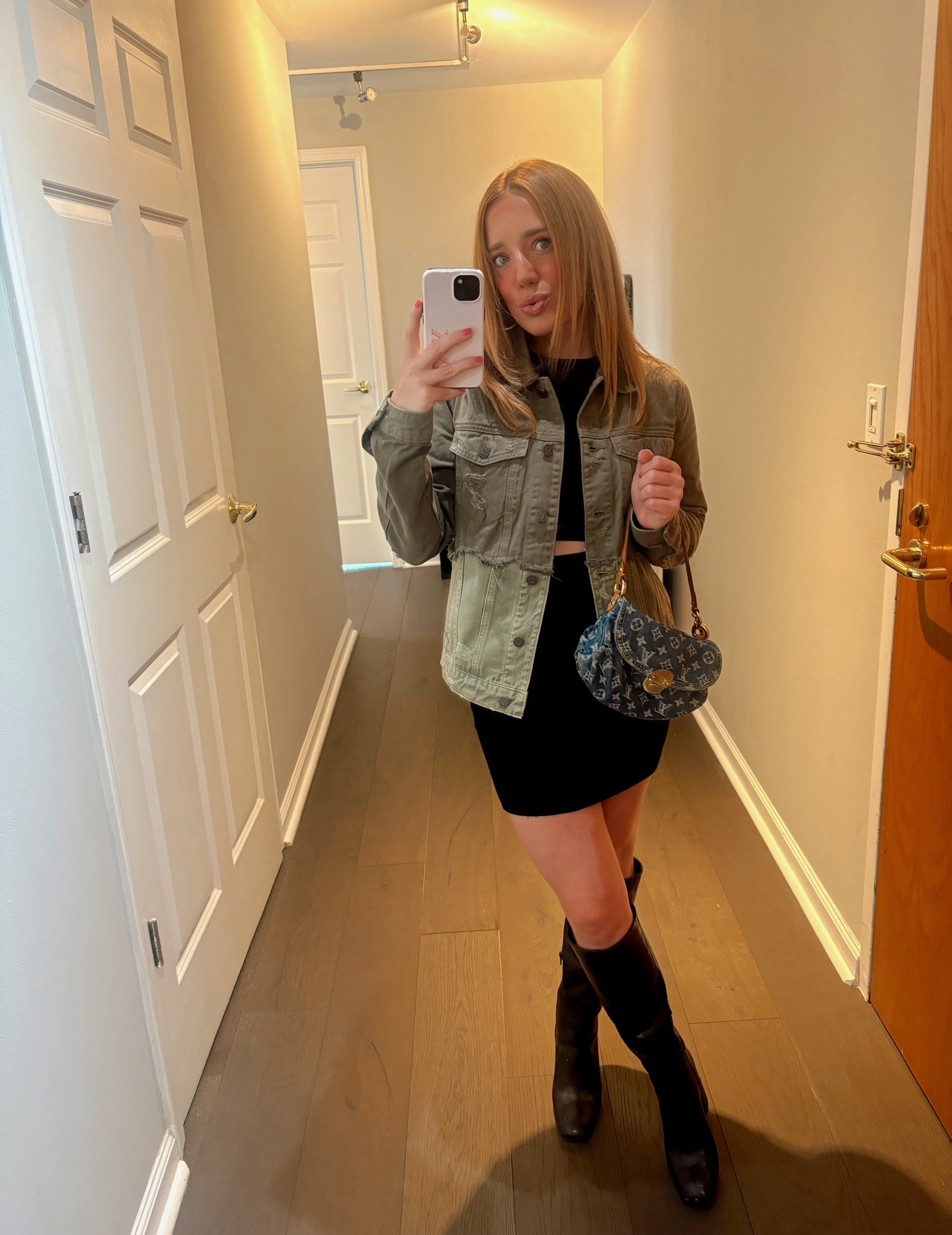 Styling this hidden Jeans denim jacket with airless black dress from Aritzia  and black high boots from Steve Madden! This jacket is the perfect addition to your fall wardrobe 