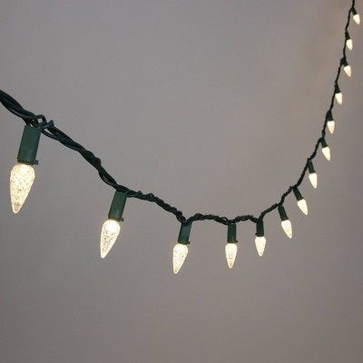 Philips 60ct LED Super Bright Faceted C6 String Lights Warm White with Green Wire | Target