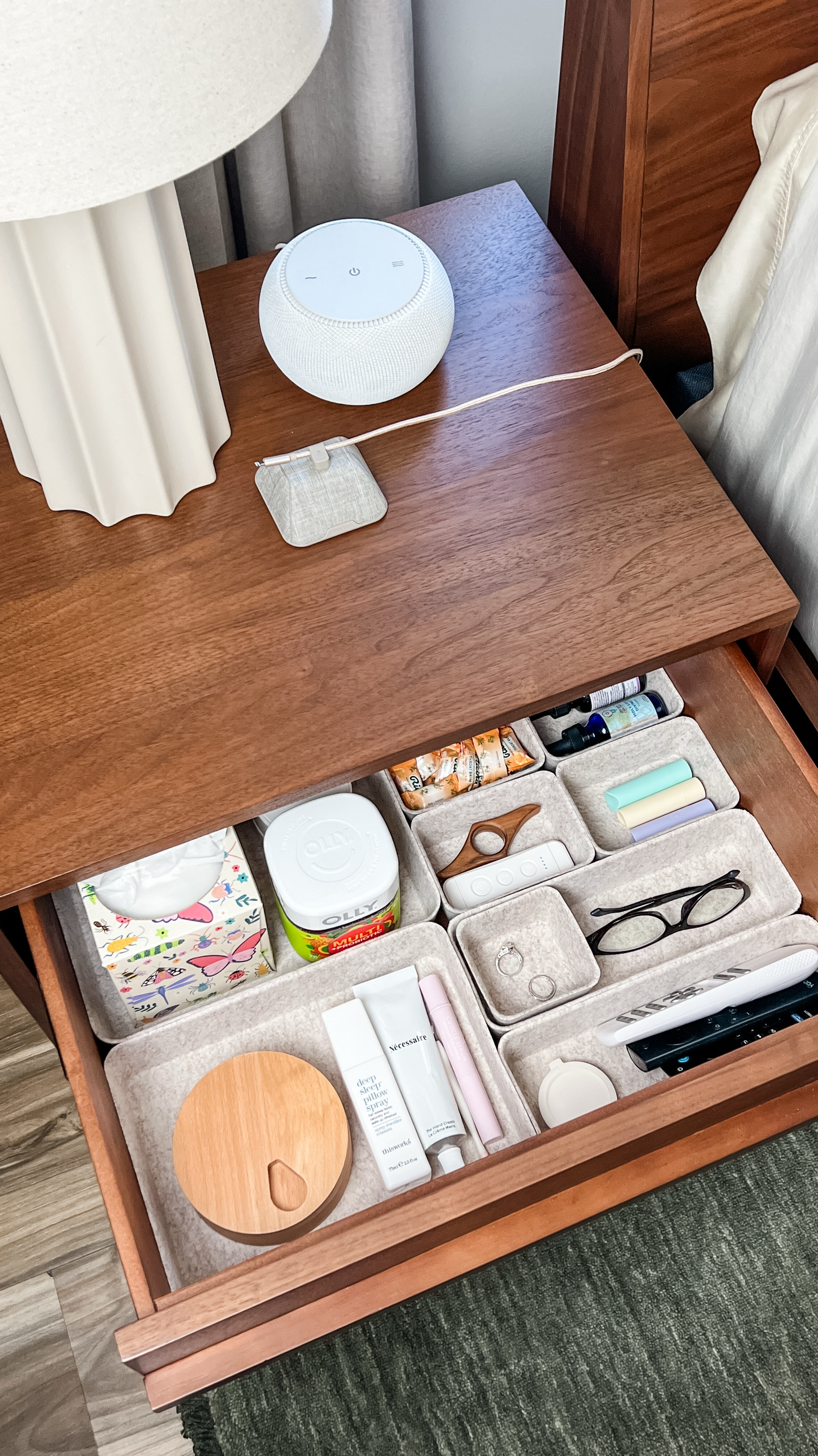 Organizing my new bedroom nightstand with deep drawers and soft felt trays.

#LTKHome