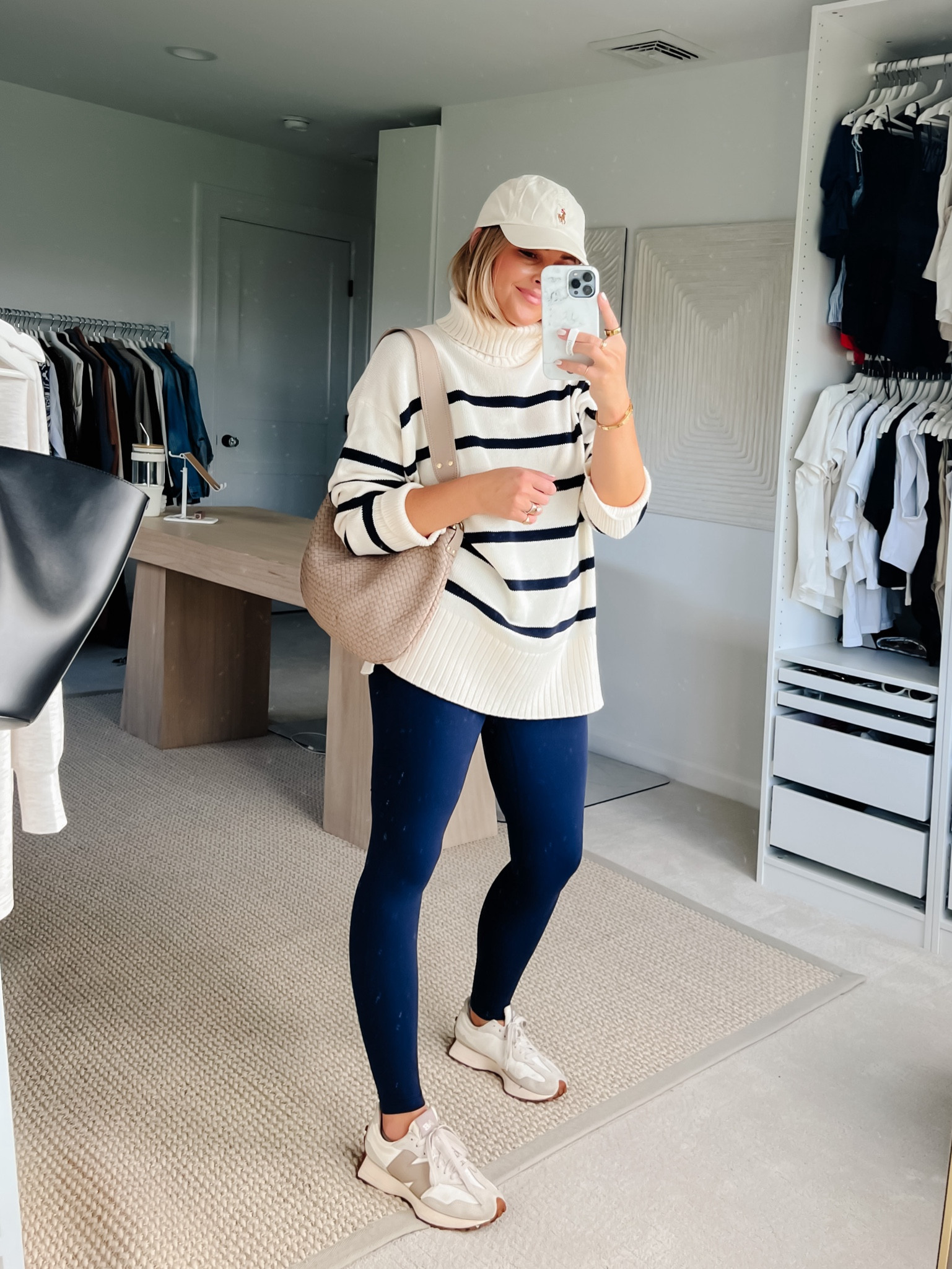 Navy Ivory Stripe cotton turtleneck sweater - mom style - toddler mom - fall athleisure 

SWEATER: it is true to size, but I went up to a medium, for an even more relaxed, fit with leggings. I’m 5’4” for reference.
LEGGINGS: I always size down in these leggings to an extra small. I find that they stretch overtime. That being said this workout profile is very compressive so so if you want some thing that’s not super tight stick with your true size.
SNEAKERS: Go down 1/2 size. Legit the most comfortable pair of sneakers I’ve ever owned.

#LTKFindsUnder50 #LTKStyleTip #LTKOver40