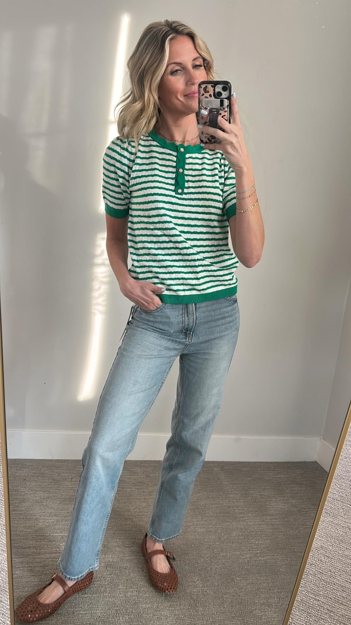 Loving this comfy striped Henley sweater. Paired it with some casual jeans and flats for an effortless look. Perfect for a cozy day out! 🌿👗

#LTKSpringSale #LTKOver40 #LTKmomlife