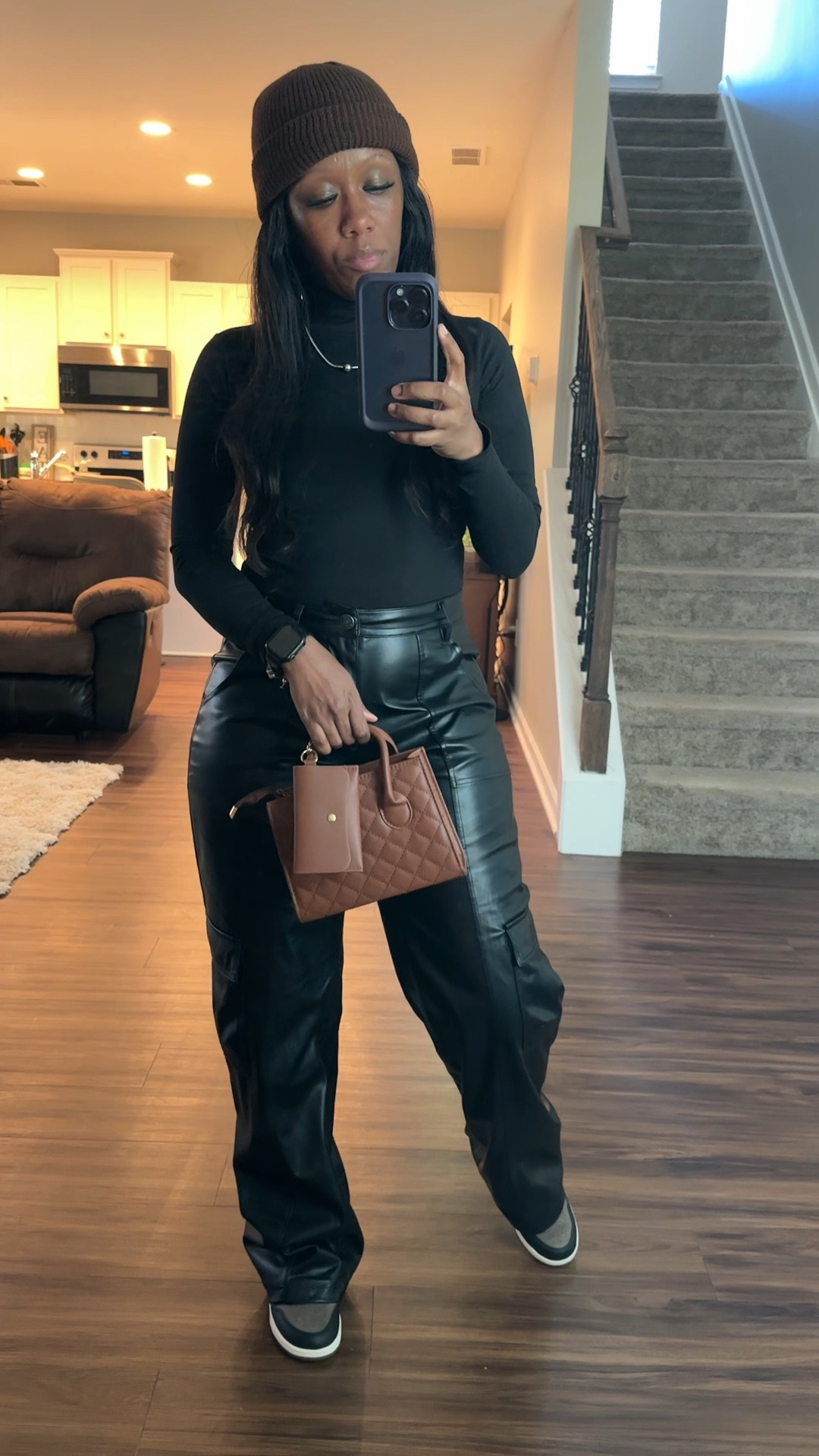 Black and Brown outfit idea.

I’m wearing a long sleeve black bodysuit, black wide leg faux leather cargo pants, brown beanie, brown purse, and Jordan 1 palomino sneakers 

#LTKShoeCrush #LTKStyleTip #LTKSeasonal