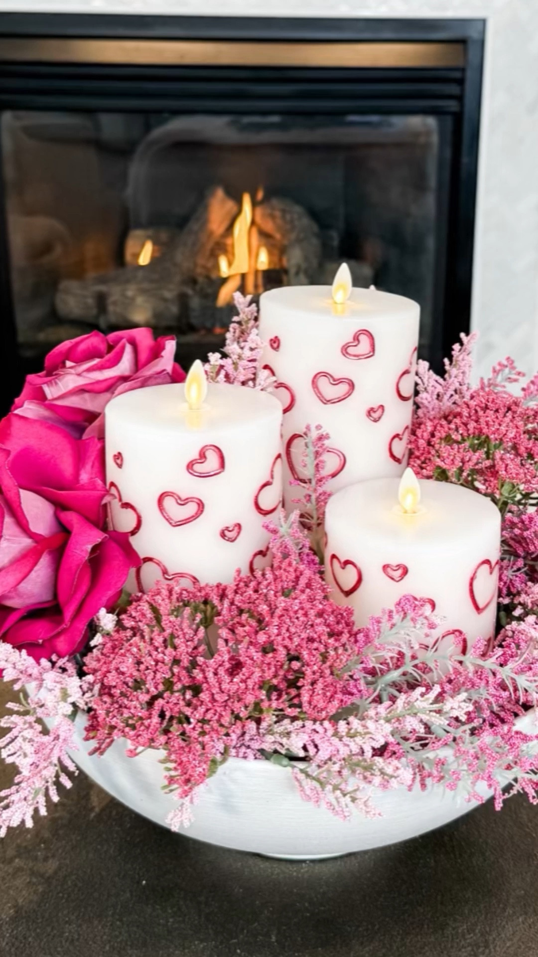 Valentine’s illuminated berry and blossom bowl arrangement with white porcelain pillar candles and hearts  embossed with metallic magenta paint.   Perfect for your Valentine’s Day table and Galentine’s gatherings. Ideal for heart and candle lovers year round!

Valentine’s Day
Flameless Candles


#LTKWatchNow #LTKSeasonal #LTKHome