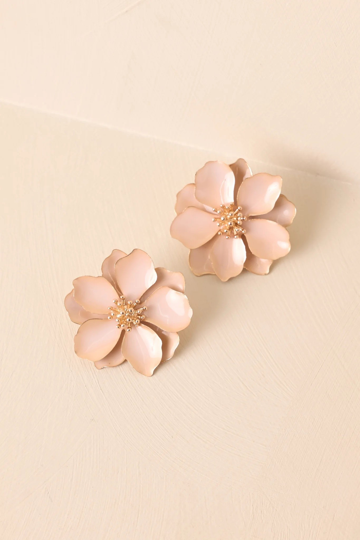 Add a touch of elegance to your best spring and summer looks in the GOING WITH THE WIND BEIGE FLOWER STATEMENT EARRINGS. These statement earrings are under $40.

Keywords: Floral earrings, beige floral earrings, spring outfits, spring accessories, summer outfits, summer accessories, garden party, spring outfits women, day date accessories, summer accessories, summer earrings, party earrings, date night accessories, spring wedding accessories, wedding guest earrings, gold hoop earrings, large statement earrings, summer wedding earrings 



#LTKTravel #LTKgrwm #LTKootd