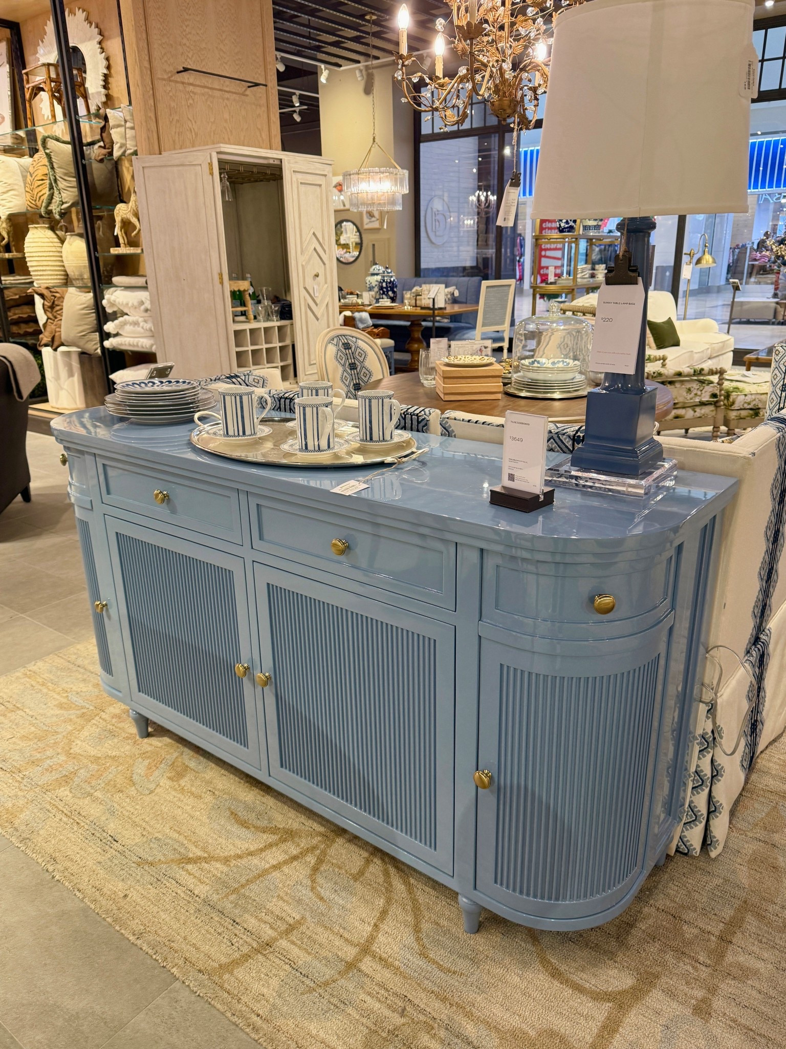 Major sale alert! 🔔 If you’ve been eyeing the Tilde Sideboard from Ballard Designs, now is the time — it’s 25% off during the Living Room Event! 😍 Such an elegant sideboard with its fluted detailing, graceful curves, and antique brass pulls. The soft blue finish has a beautiful glossy depth that feels refined yet stylish! ✨ A stunning statement piece with generous hidden storage to keep everything tucked away. Linked this one and other blue sideboards to shop! 🩵 #BallardDesigns #Sideboard #Credenza 

#LTKSaleAlert #LTKHome