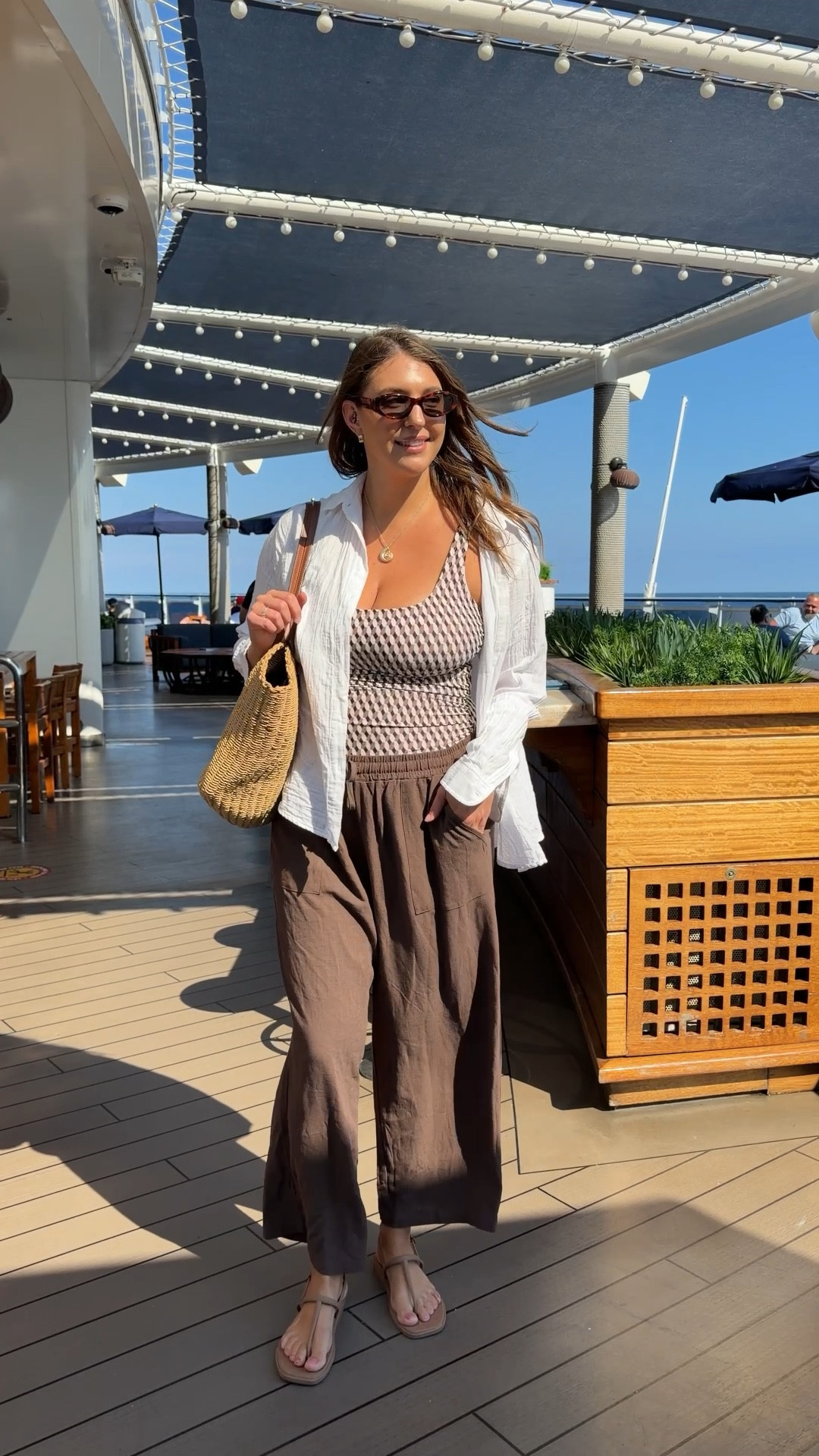 Breezy neutrals, cruise coffee run ☕️🌊

linen button down shirt, wide leg brown pants, neutral resort outfit, cruise day look, woven straw tote bag, comfy flat sandals, coastal chic style

#LTKTravel #LTKMidsize #LTKSeasonal