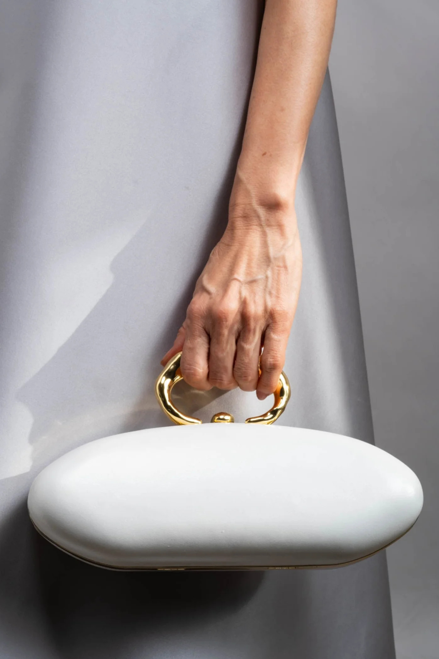 White Pearl Molten Gold Bullet Minaudière | White Pearl Leather Clutch Purse | Alexis Bittar