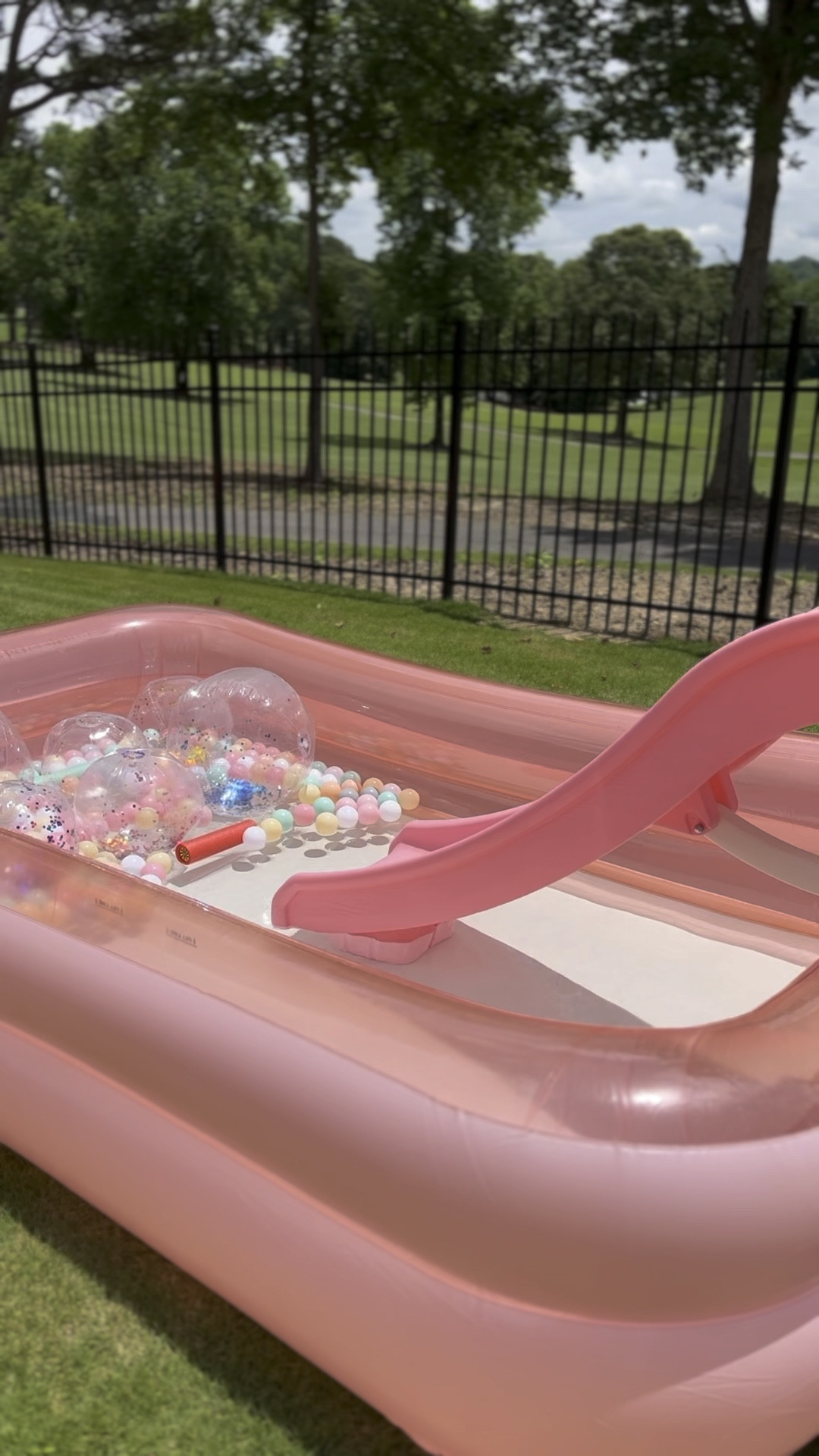 10-ft. pink inflatable family pool with a tall pink slide (that’s also foldable!). This was great for the smaller kids (ages 2-6). We added some glitter beach balls & plastic balls.

#LTKkids