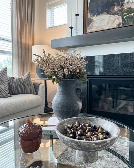 Fall coffee table styling with marble bowls, vintage pottery vases and cozy candles. 

Fall decor, home decor 

#ltkstyletip
#ltkunder100

#LTKfindsunder50 #LTKhome #LTKSeasonal