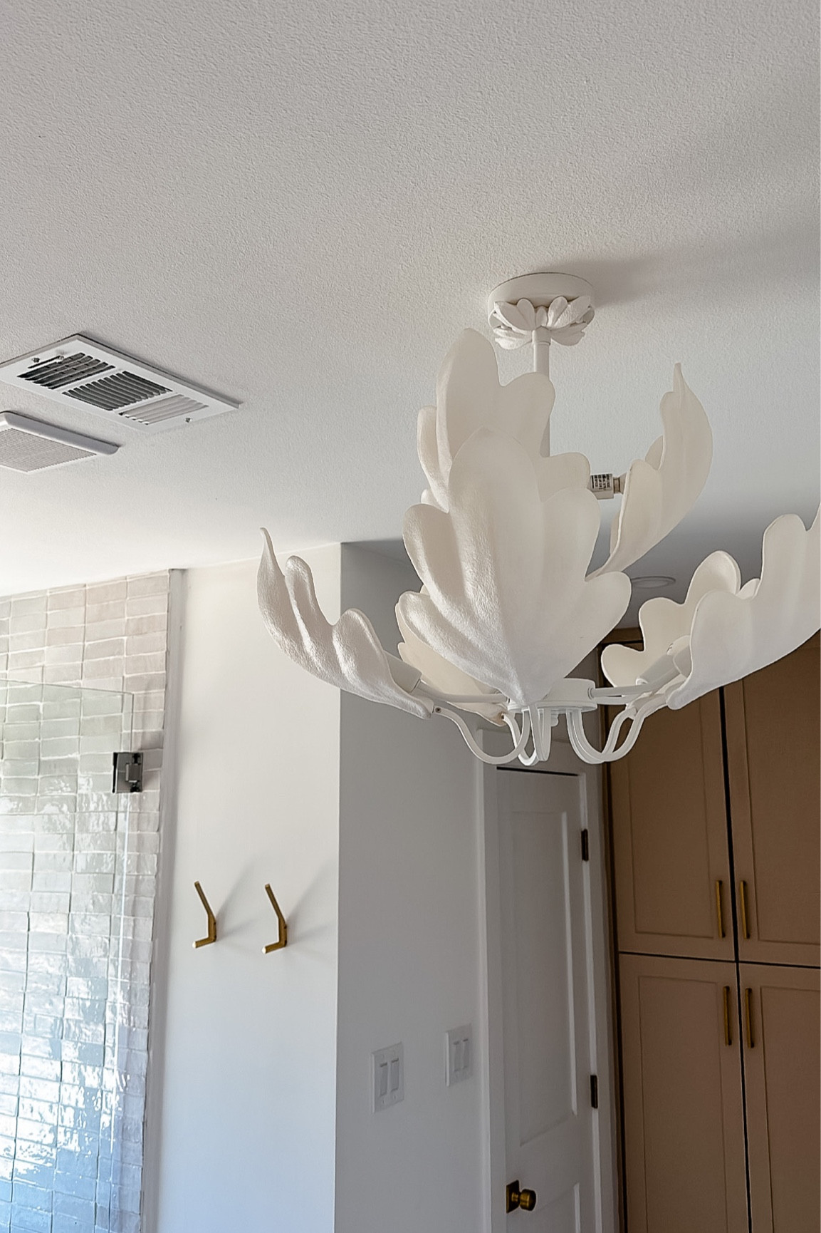 White light fixture, white chandelier, white light, bathroom chandelier

#LTKhome #LTKunder50 #LTKunder100