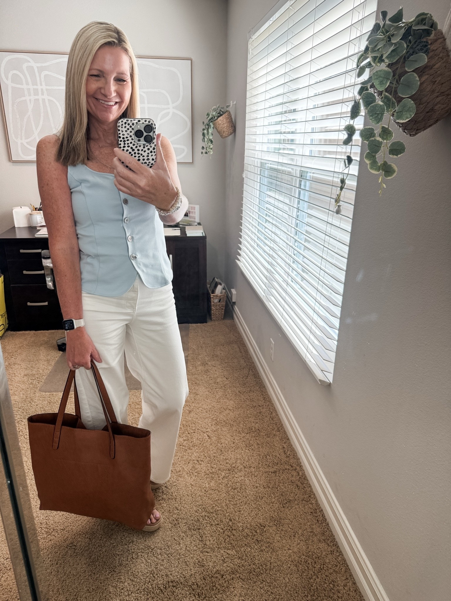Outfit of the day for a day in the office. My Target jeans are almost sold out in white but come in multiple wash options. 

My Old Navy vest is in major clearance and still in stock in light blue.

#LTKWorkwear #LTKSaleAlert #LTKOver40