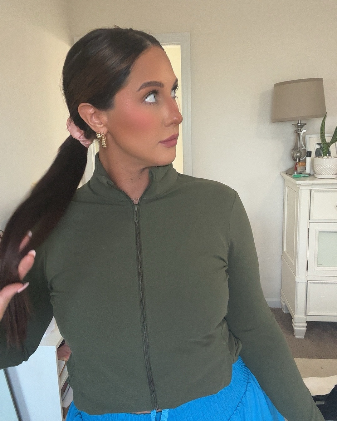 This lightweight zip up jacket in this olive green, is perfect for a fall day heading to the gym or going for a walk! You can even tuck it under to give it a cropped fit. 🫶

#LTKFitness #LTKSeasonal