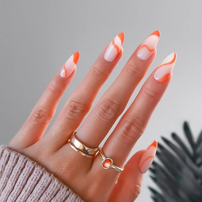 RikView Medium Press On Nails - French Fake Almond Acrylic Nails Clear Orange with Swirls Design | Amazon (US)