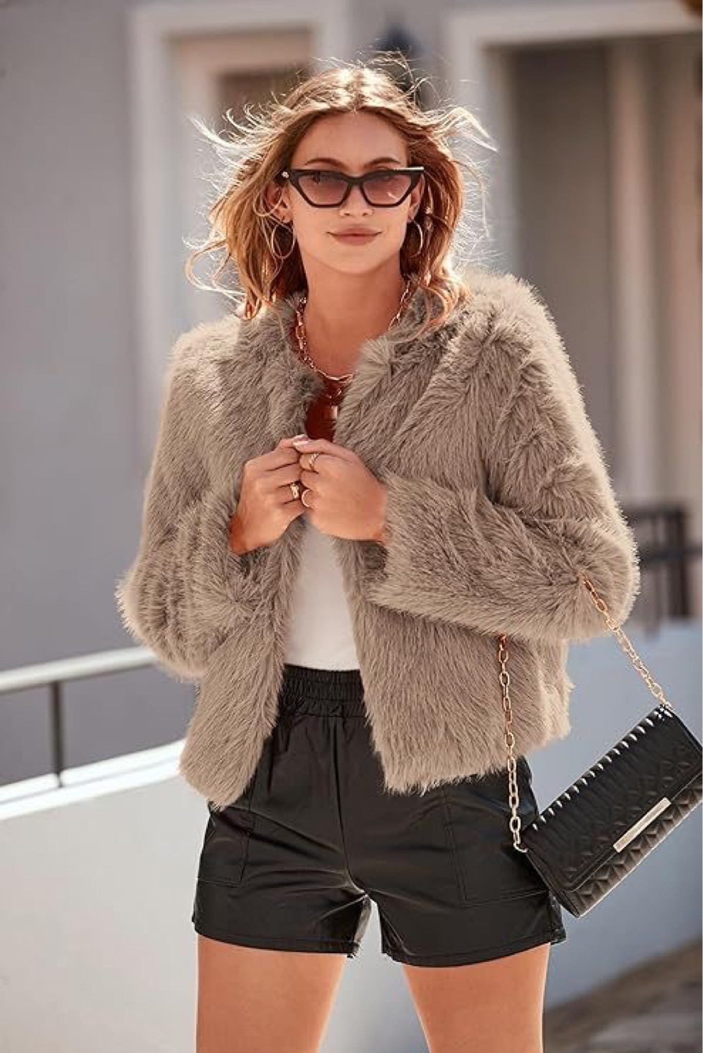Loving this faux fur jacket! It comes in 9 colors including black. Looks so cute with leather shorts, jeans, leather pants, or a sweater dress! 

#LTKover40 #LTKfindsunder50 #LTKstyletip