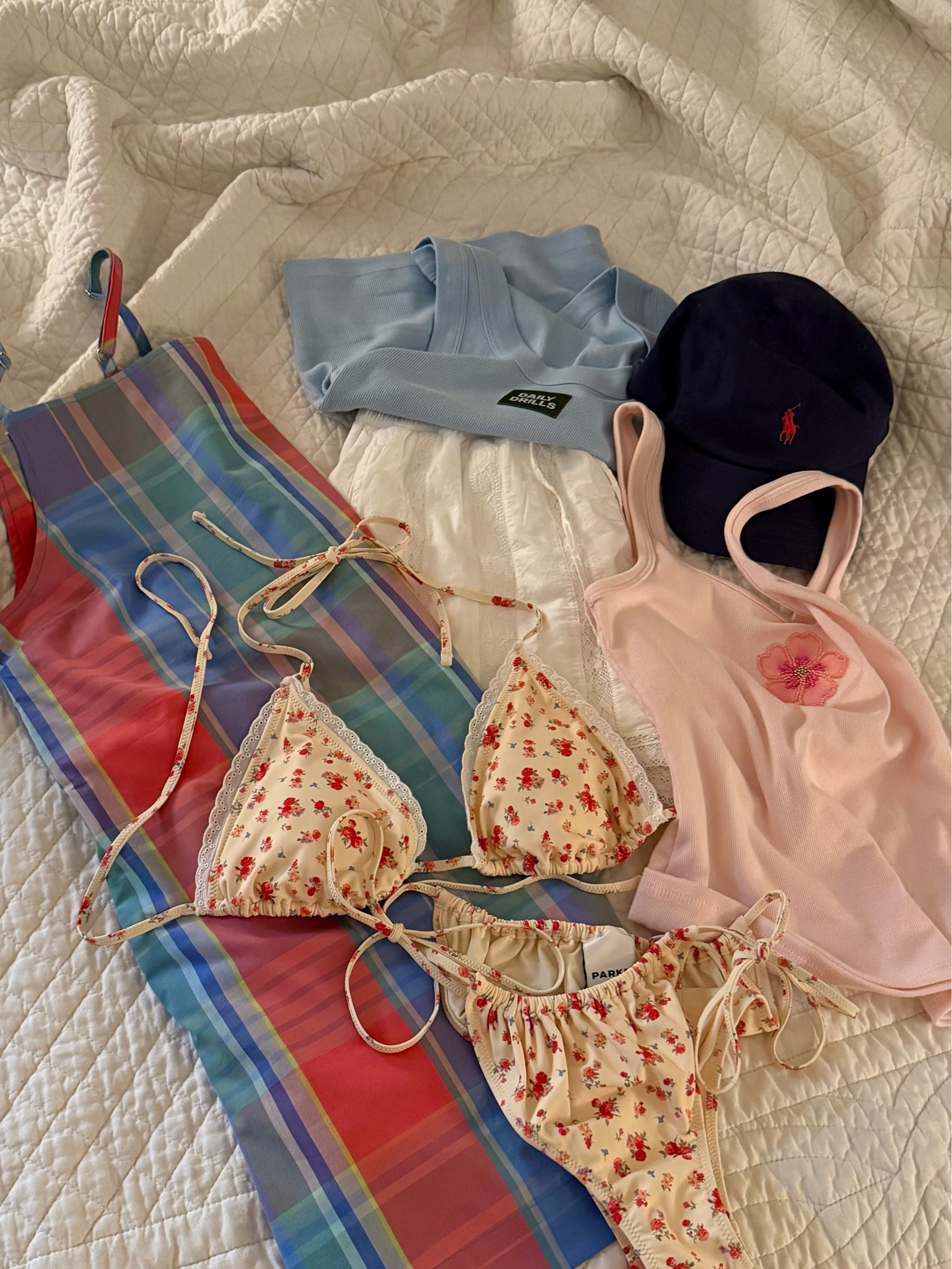 Plaid dress is the “Margaret Dress” from Dairy Boy
Blue tank is from Daily Drills. Looks like it’s out of stock rn so I linked similar!
Cream floral swimsuit is from Target. Also out of stock, linked another cute suit!
Beaded flower tank is from Target
White cotton shorts are from Abercrombie. Selling fast so I linked other options!
Navy Polo Ralph Lauren hat

#LTKdayinmylife #LTKgrwm #LTKootd