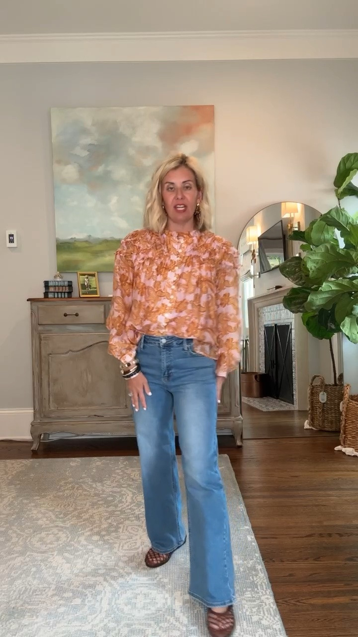 Obsessed with this orange & pink top! The flow and ruffles are perfect! 
Top - xs
Jeans - 26
Jelly’s - 8 tts

*code mixandmatch15 at Avara

#LTKdayinmylife #LTKootd #LTKmomlife