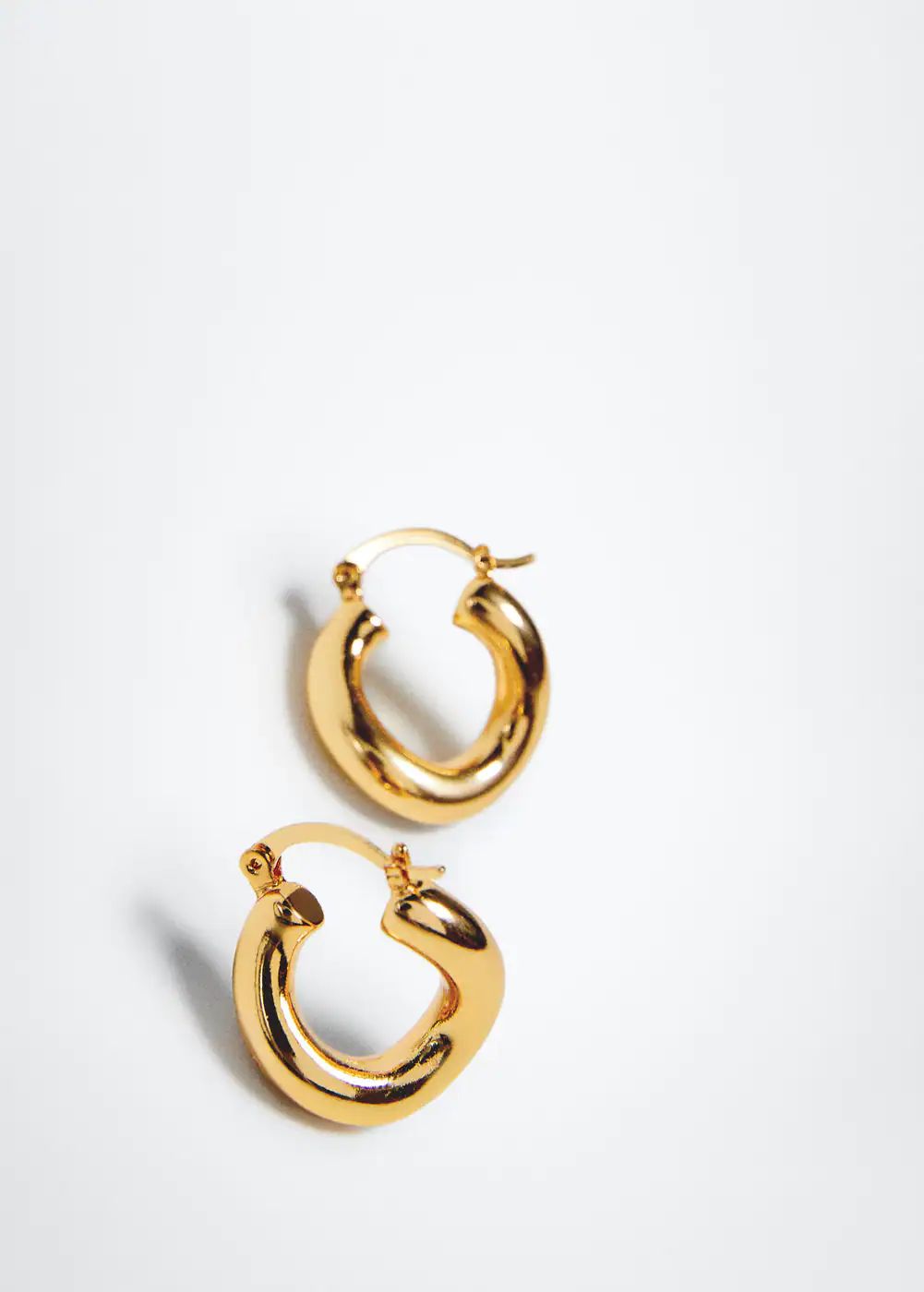 Twisted hoop earrings -  Women | Mango USA | MANGO (US)