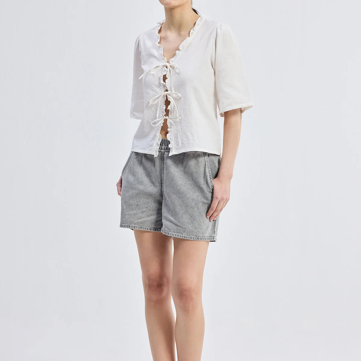Relaxed Fit Top With Ruffles and Front-Ties in White | Reistor