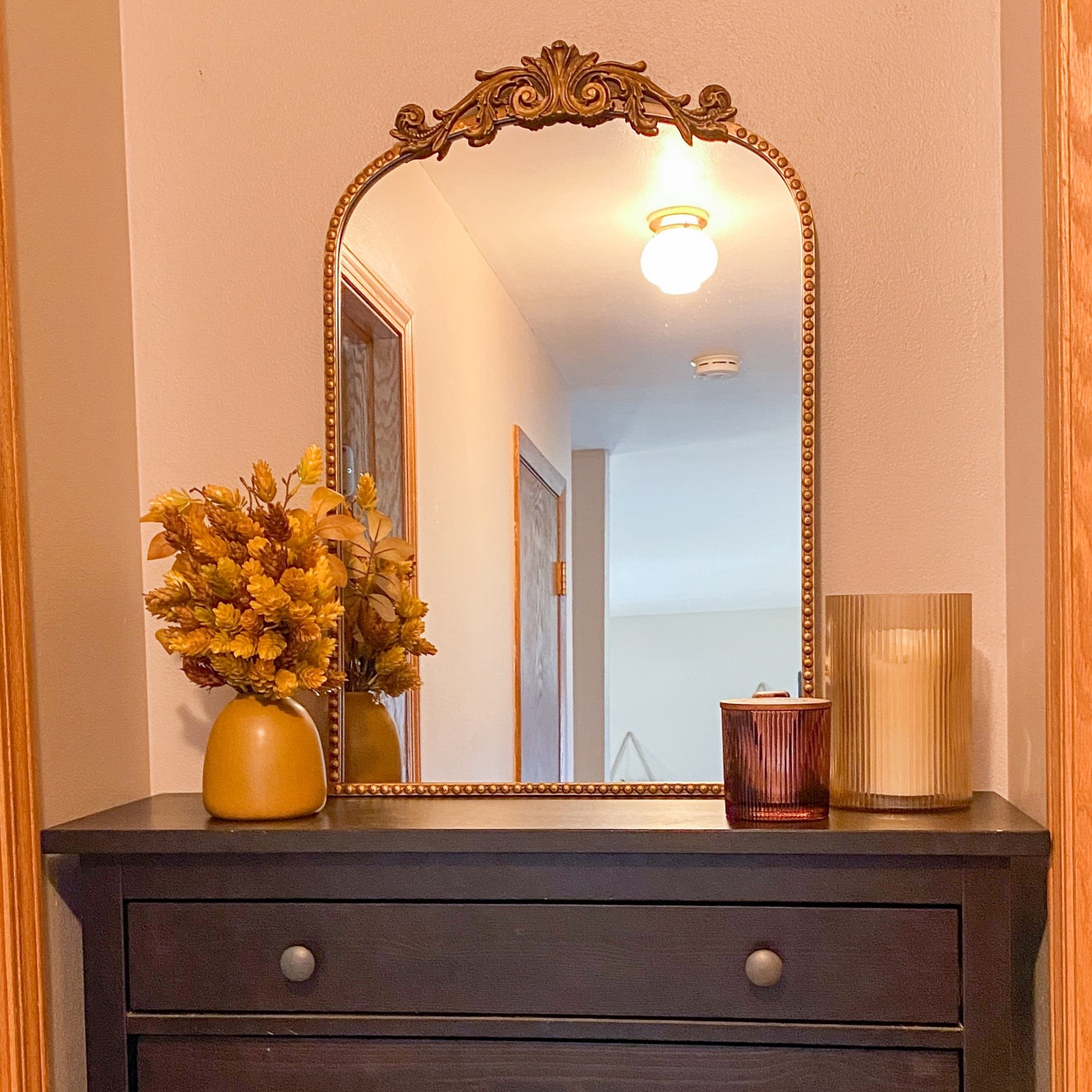 The hallway needed a bit of a fall touch. 

Fall home decor 
Wall mirror 
Artificial flowers 
Vase
Fall candles



#LTKSeasonal #LTKHome