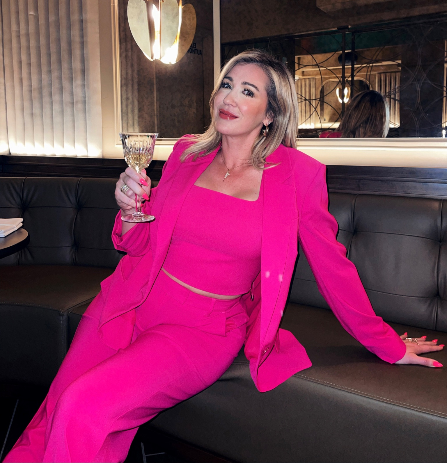 Medium in jacket 
Medium in crop tank
Size 6 in pants 