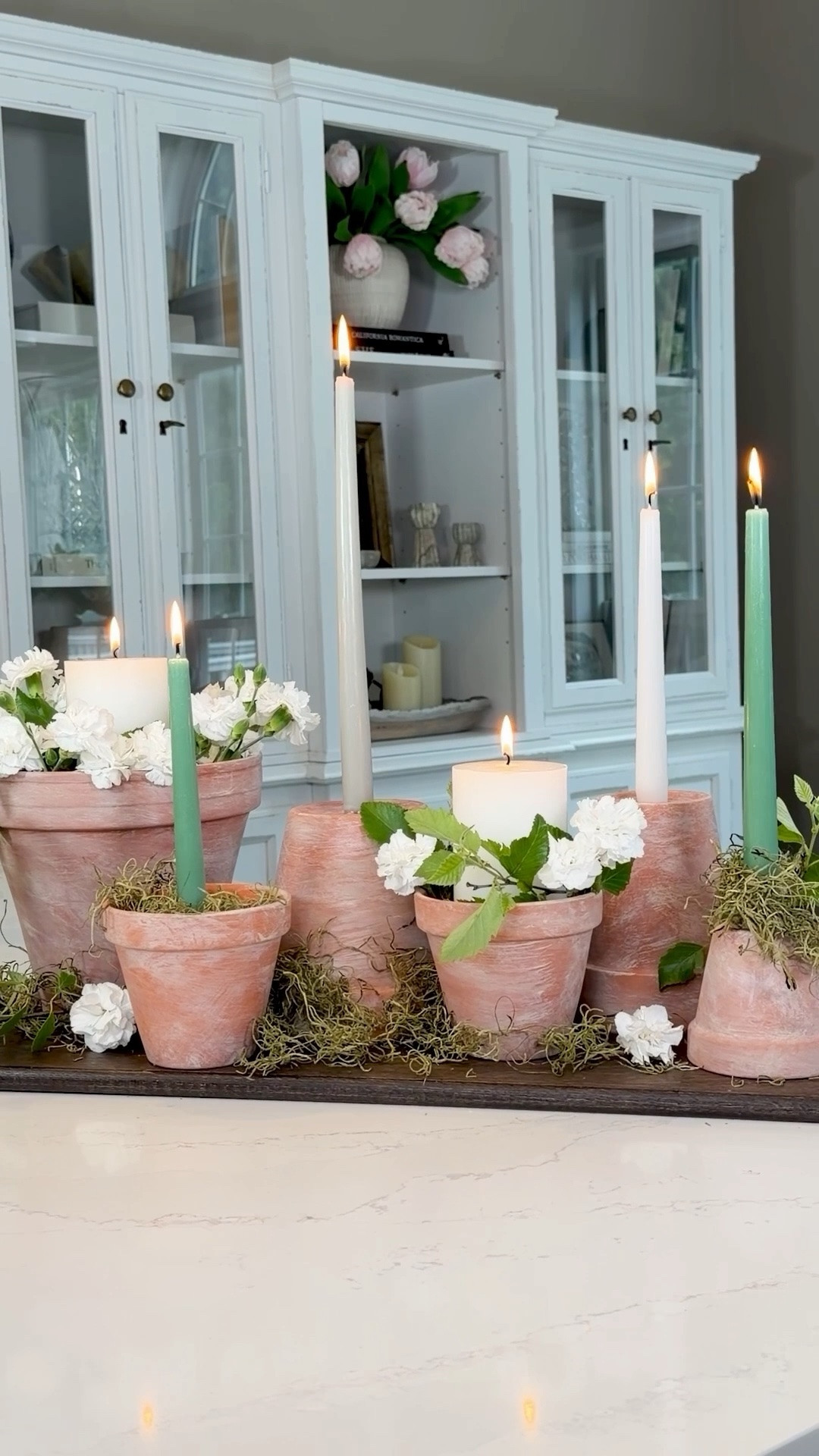 Flower Pot + Candle Centerpiece 🪴Flower pots aren’t just for plants anymore. Try using terracotta pots both upright and upside down for candle pedestals, layered height, and that relaxed European-inspired summer table feel.

#LTKdayinmylife #LTKSeasonal #LTKHome