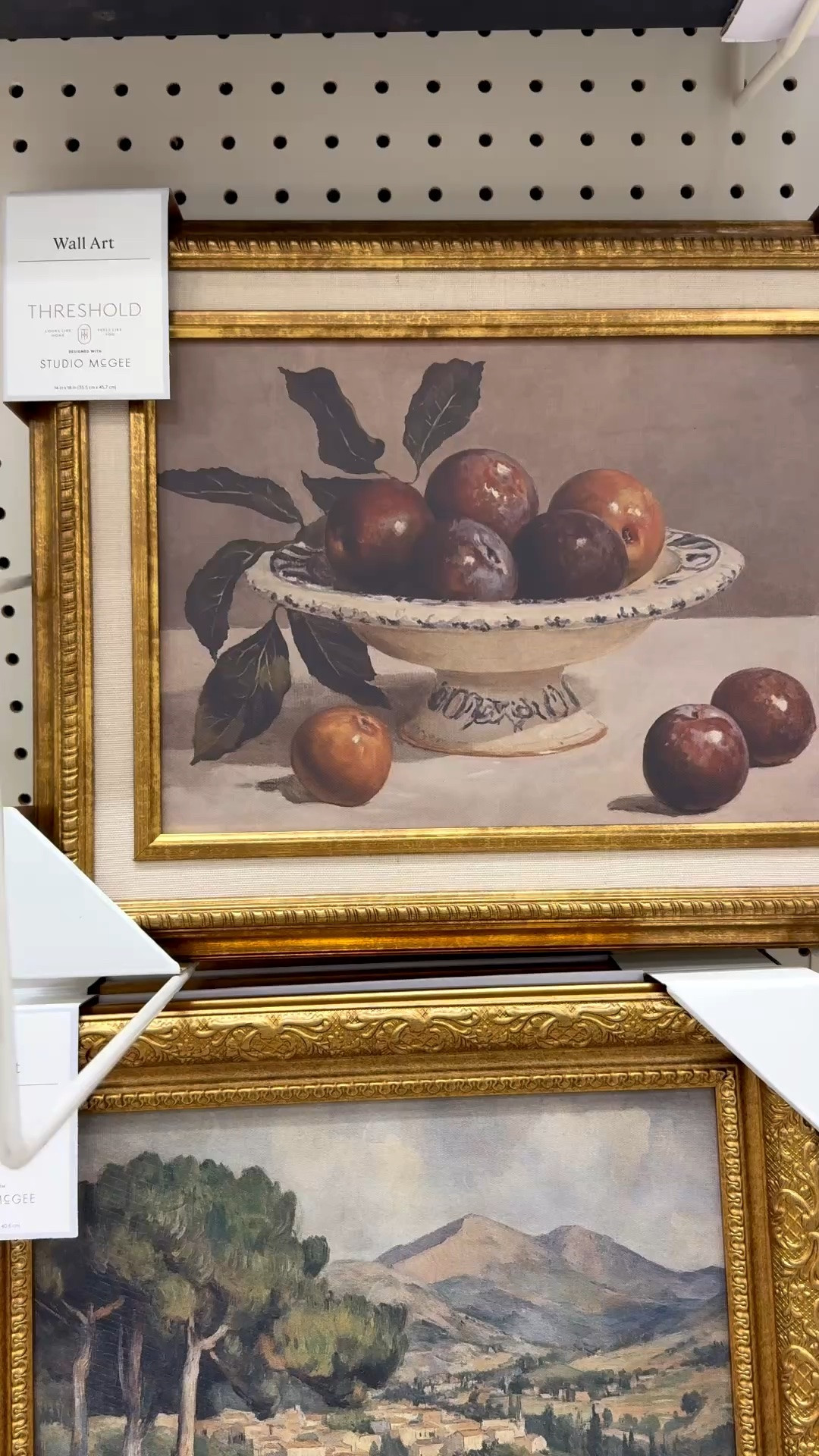 I’ll be honest, I wasn’t planning on buying any art. I usually prefer antique or vintage art in my home. But, these two caught my eye and they’re so gorgeous. I bought the still life framed art, but could easily find a place for the landscape one too.