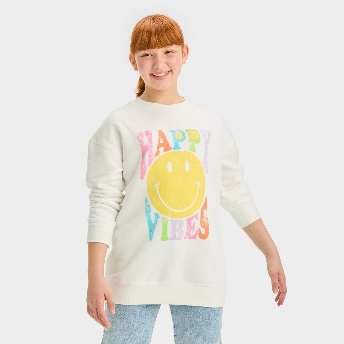 Girls' Oversized Fleece Crewneck Smiley Graphic Pullover Sweatshirt - art class™ White | Target