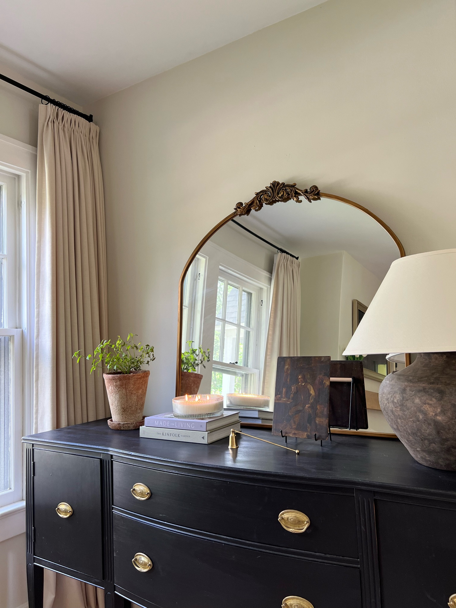 This sideboard table is the first piece of furniture I bought for our home. I found it on FB marketplace and my friend helped me repaint it and polish the brass hardware. It’s my favorite piece to style and I don’t think I will ever part with it 🖤

#antiquesideboard #sideboard #sideboardstyling #homedecor #homedecorating #homestyling 

#LTKHome
