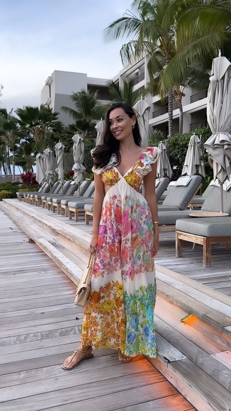 Kat Jamieson wears a Zimmermann dress. Hawaii outfit, vacation outfit, spring fashion, floral dress, resortwear, Chanel bag, Chanel sandals. 

#LTKtravel #LTKitbag #LTKSeasonal