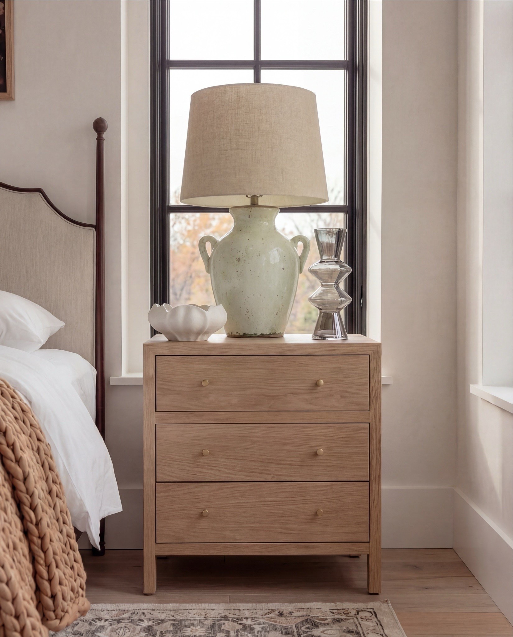 Shop the Look: Bedroom Refresh
Furniture & Decor
	•	Upholstered wood bed frame (cream fabric)
	•	White bedding set
	•	Chunky knit throw (camel)
	•	Patterned accent pillows (rust/brown)
	•	Wood nightstands
	•	Ceramic white table lamps white shade)
	•	Curved brass-framed wall mirror
	•	Framed floral wall art above bed
	•	Upholstered boucle bench stools (set of two)
	•	Vintage-style area rug (neutral pattern)
	•	Wood dresser with brass corner details
	•	Decorative ceramic vase
	•	Stacked neutral books
	•	Brass decorative tray
	•	Sculptural brass object
	•	Framed artwork above dresser

#LTKHome #LTKSaleAlert