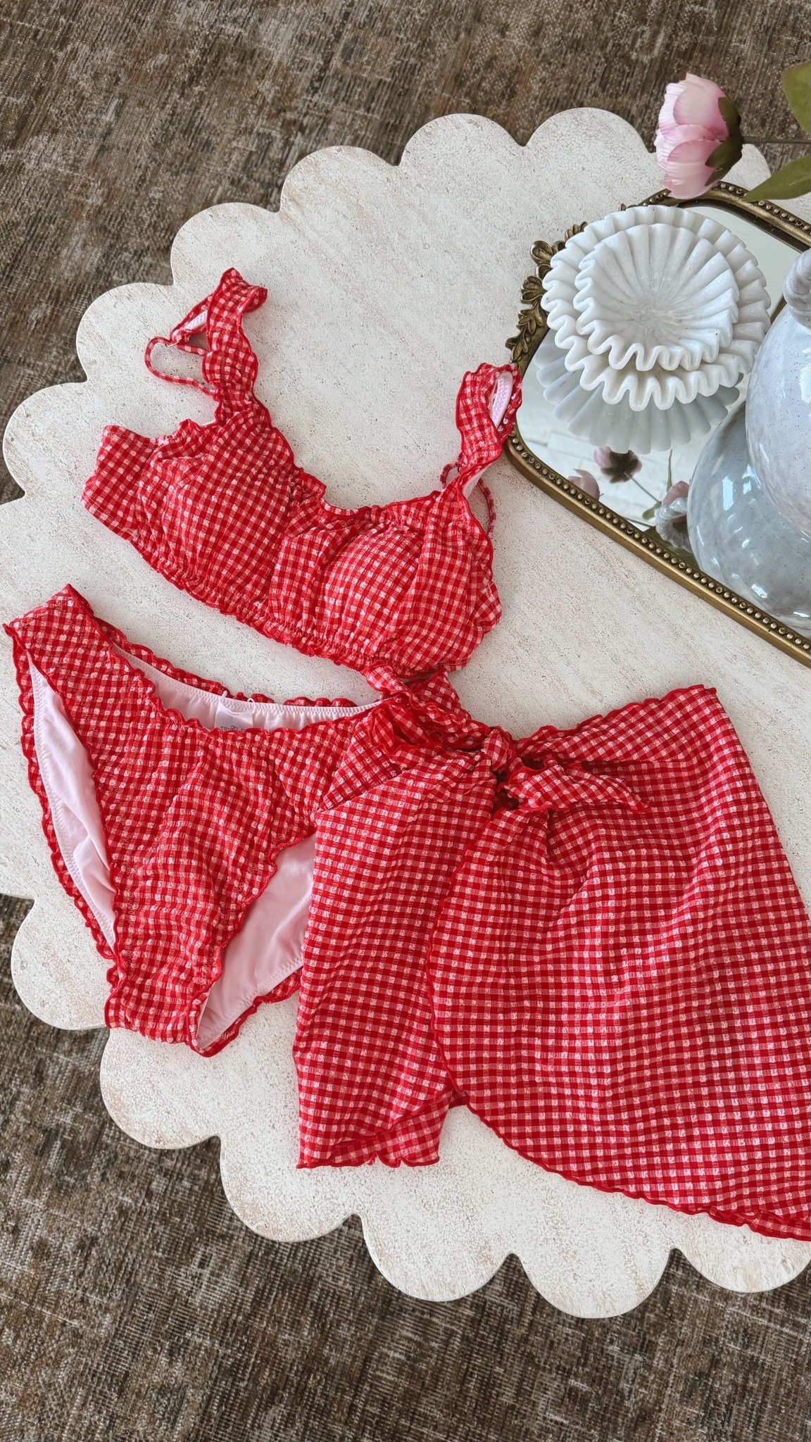 The cutest gingham swim suit from Target! It’s on sale for Memorial Day! The little wrap skirt is the cutest addition but the bottoms are also really great coverage! I sized up 1! @target #ad #sponsored

#LTKSeasonal #LTKSwim #LTKSaleAlert