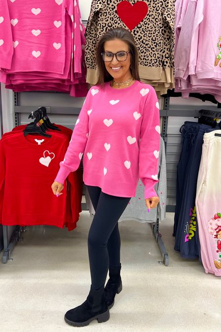 Valentine’s Day sweater - I sized up 2 to a large for a longer, oversized fit. Getting your normal size will give you a more fitted, preppy look. I wanted a more slouchy, comfy look.

Leggings are smalls.

Valentine’s Day sweater, winter fashion, heart sweater, pink sweater, teacher outfit, work outfit, casual outfit 

#LTKfindsunder50 #LTKSeasonal #LTKstyletip