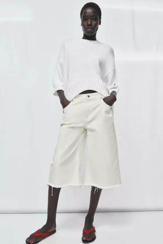 ASYMMETRIC HEM SHORT SLEEVE KNIT JUMPER | Zara US