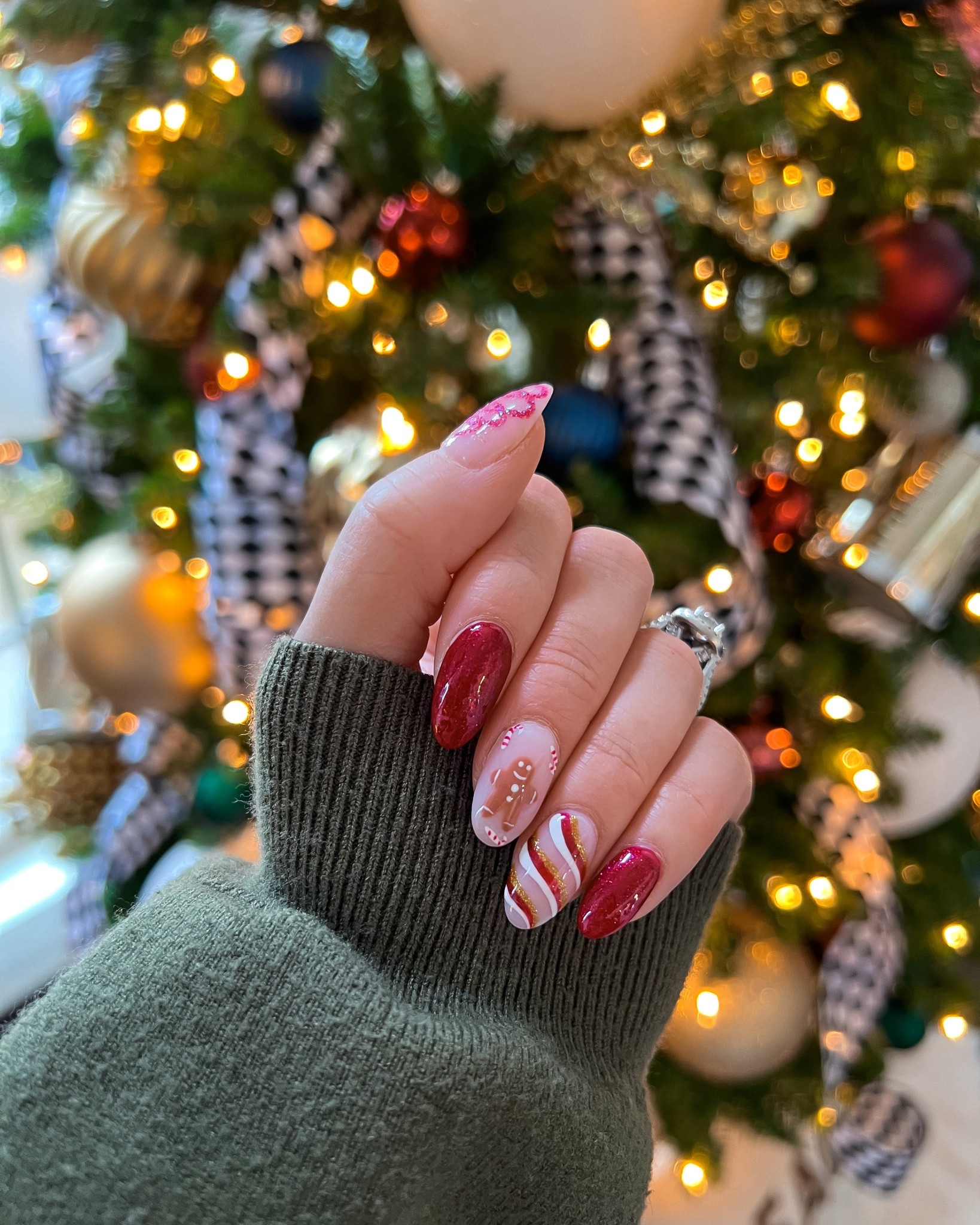 Christmas nails. Candy cane nails. Gingerbread nails. Burgundy nails. Holiday nails. Nail inspo. 

#LTKBeauty #LTKHoliday