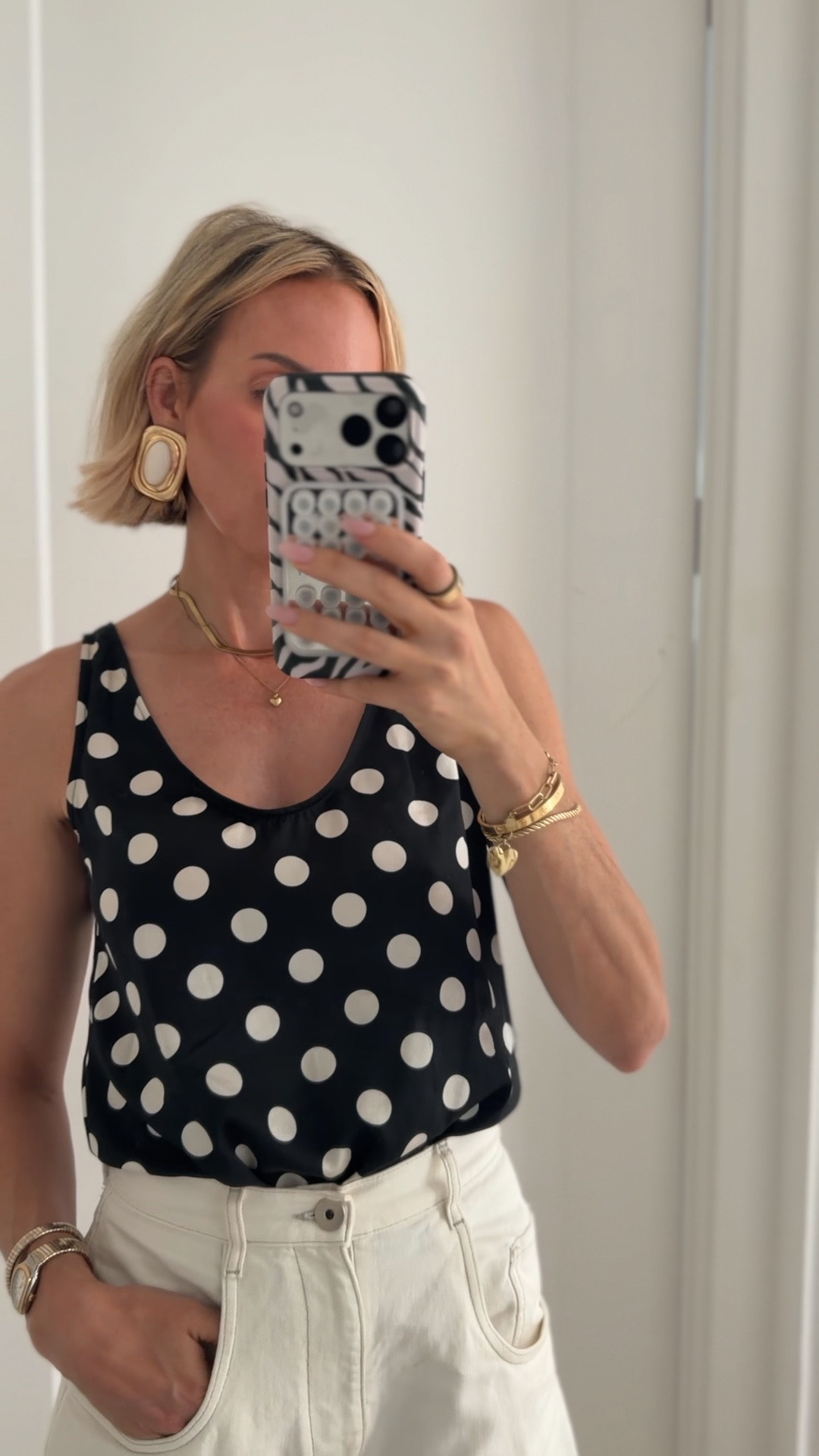 This top is so classy. I also love the scoop back. I also have it in just a plain creamy color. Wearing a small.￼I feel so Parisian in it. Jeans run tts ￼￼

#LTKootd #LTKdayinmylife #LTKOver40