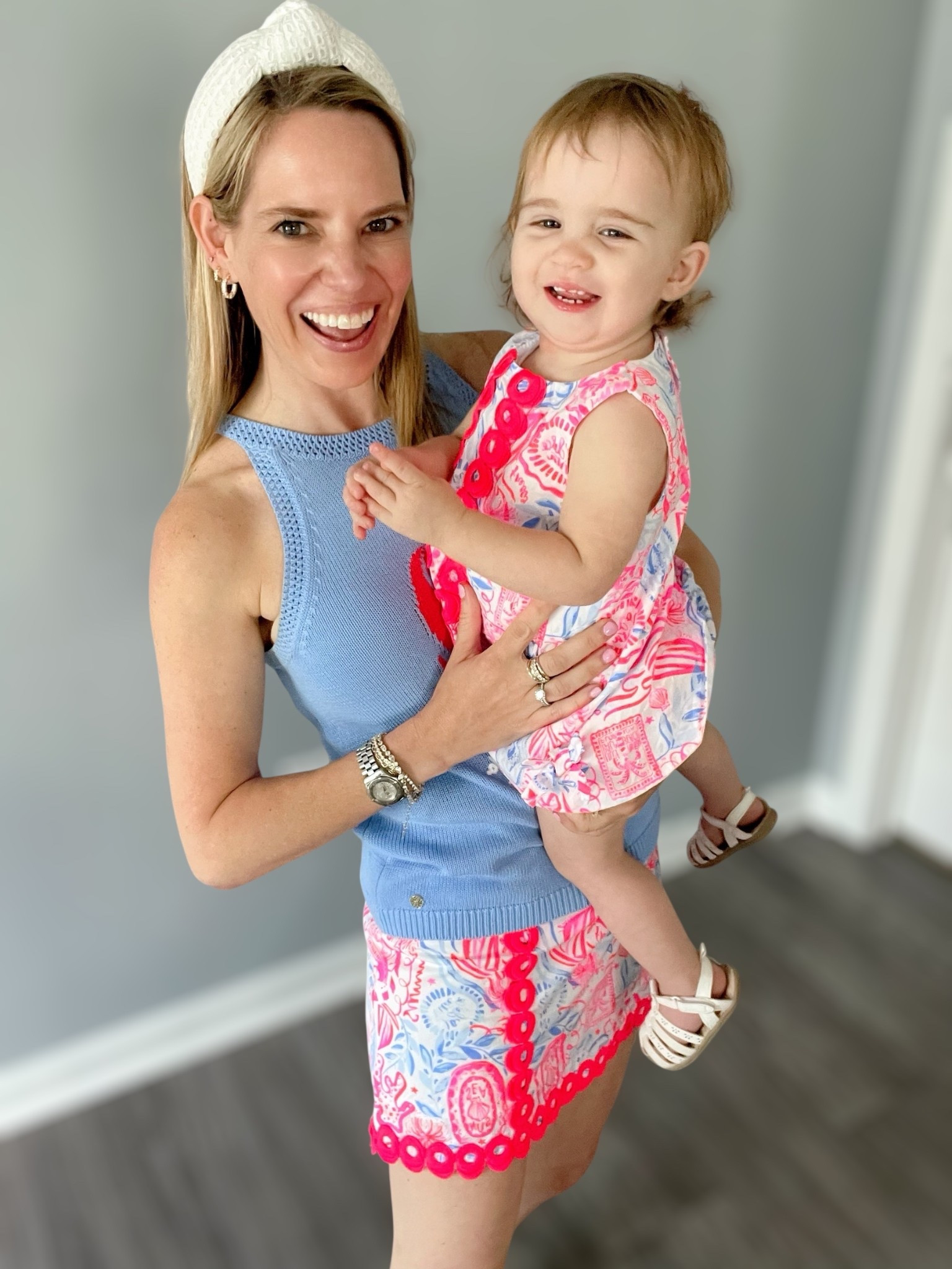 🎀 Mommy & Me in Lilly Pulitzer Pink Perfection
Nothing says summer quite like a bold Lilly print 💗 This mommy-and-me matching moment is full of color, charm, and coastal chic vibes from head to toe 🌊☀️

👩‍👧 Mom’s Look:
	•	Wearing the Lilly Pulitzer Scallop Skort in size 0 — features an eye-catching pink + blue border print and that signature scalloped hem 💕
	•	Paired with a soft blue knit sleeveless sweater in size XS, perfect for layering or styling solo 🔹
	•	White textured headband + white slide sandals complete the look 🤍
	•	✨ Jewelry by Melinda Maria — use code PREPPYREBEL for 10% off your order! 💛

👧 Baby Girl’s Look:
	•	Matching infant Lilly shift dress (size 12–18M) in the coordinating print 🎨
	•	Classic shift style with pink ric-rac trim, button shoulders, and all the summer sweetness 🍭
	•	Styled with white sandals for a breezy finish 👣

Perfect for brunch, beach trips, or just twinning in your favorite print!

⸻

#LTKMomStyle #MommyAndMeLooks #LillyPulitzer #PreppyStyle #ScallopSkort #InfantShiftDress #MatchingMoments #SummerOutfitInspo #CoastalStyle #MelindaMariaJewelry #PREPPYREBEL

#LTKKids #LTKFamily #LTKBaby