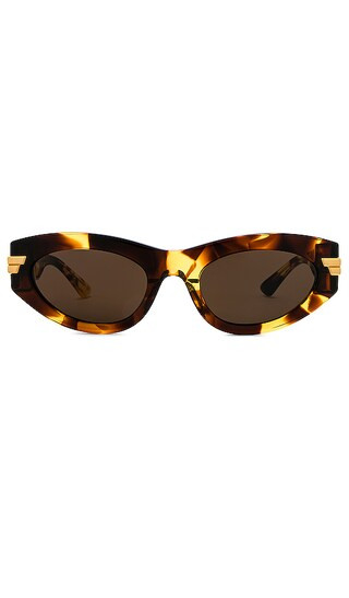 Bold Ribbon Cat Eye Sunglasses in Havana | Revolve Clothing (Global)