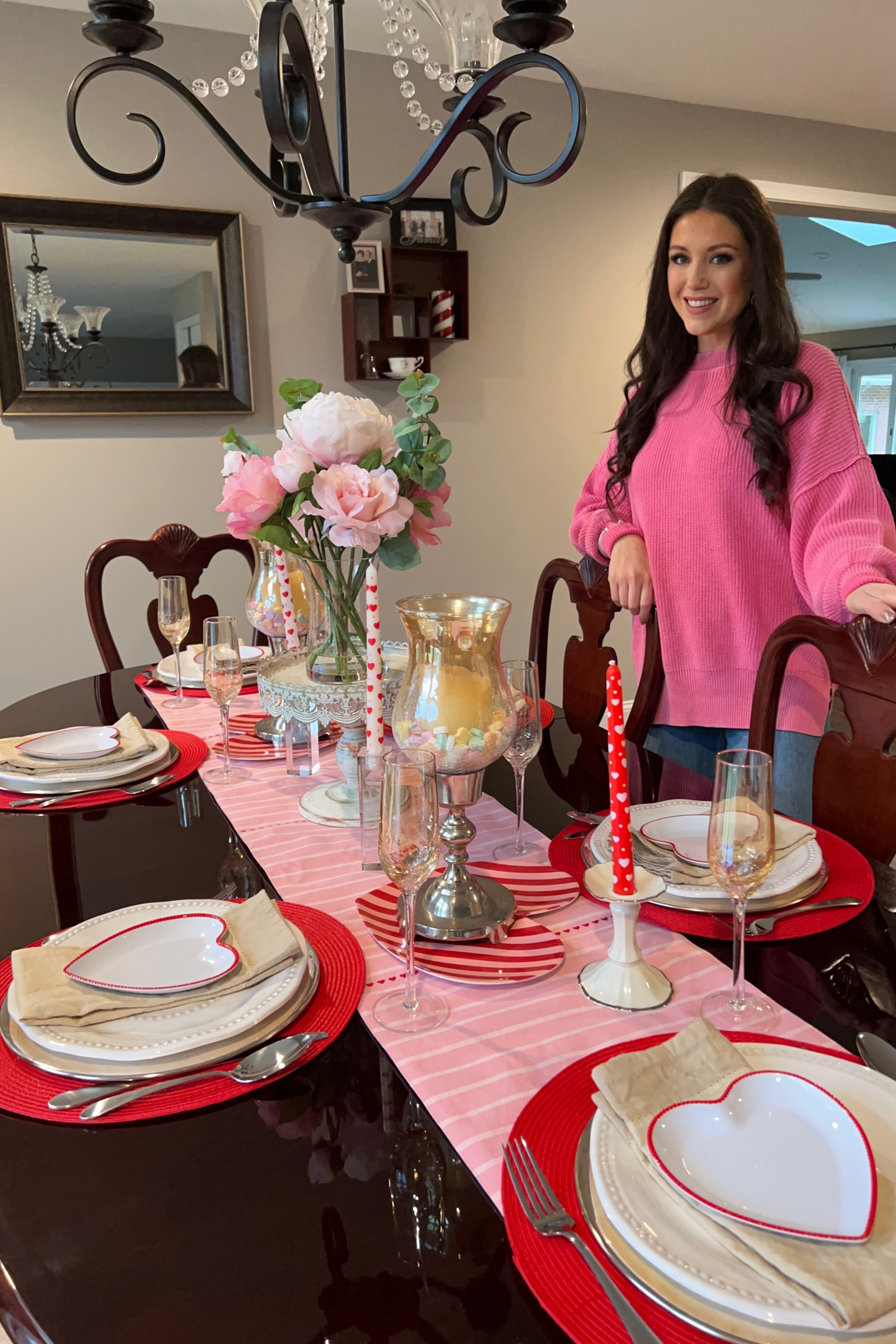 Valentine’s Day table, valentines tablescape, heart bowl, heart plate, pink glasses, girly dining room, girly kitchen, pink kitchen, pink dining room, Valentine’s Day decor, pink champagne glasses, red woven placemat, red round placemat, silver charger, plate charger, set the table, valentines table, silver plate charger, heart taper candles, Valentine’s Day candles, dining room candles, melamine plates, Valentine’s Day outfit, pink sweater, pink valentines look, casual Valentine’s Day look, spring outfit idea, Gucci bag, Abercrombie jeans, Steve Madden mules, ootd spring, outfit ideas, what I wore, casual ootd, spring sweater, spring look, bold colors, oversized sweater, sweater and jeans look, affordable fashion, heart earrings, Valentine’s Day earrings, Valentine’s Day sweater

#LTKhome #LTKFind #LTKSeasonal