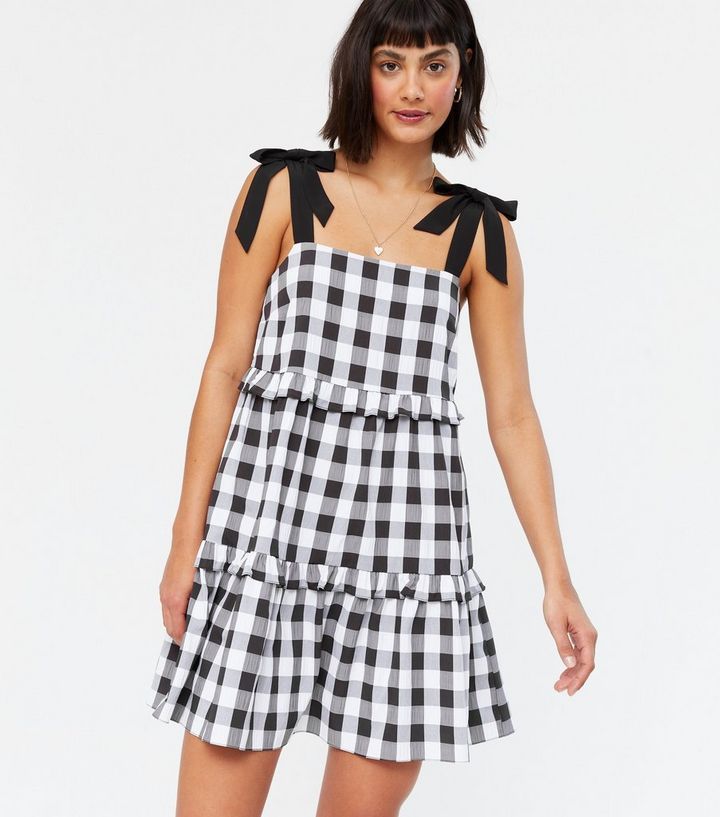 Black Gingham Tiered Tie Strap Mini Dress
						
						Add to Saved Items
						Remove from Saved... | New Look (UK)