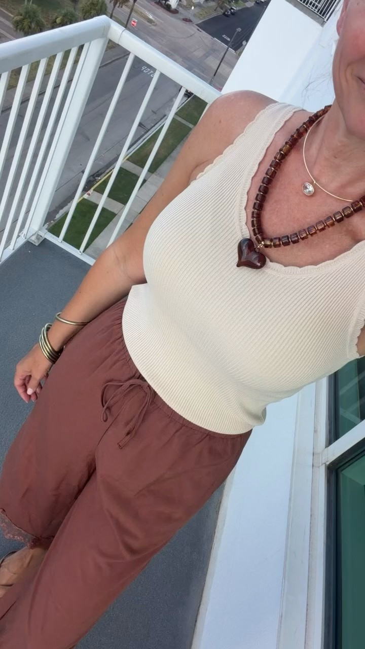 These lace trim pants are such a fun change from basic joggers. The drawstring waist keeps them comfortable, while the lace at the ankle makes them cute enough to wear with a simple tank and sandals for dinner or vacation.

Lace trim pants, drawstring pants, casual outfit, vacation outfit, comfortable pants, summer style, neutral tank, dinner outfit, relaxed pants, transitional fashion, HauteandHumid

#LTKootd #LTKdayinmylife #LTKmomlife