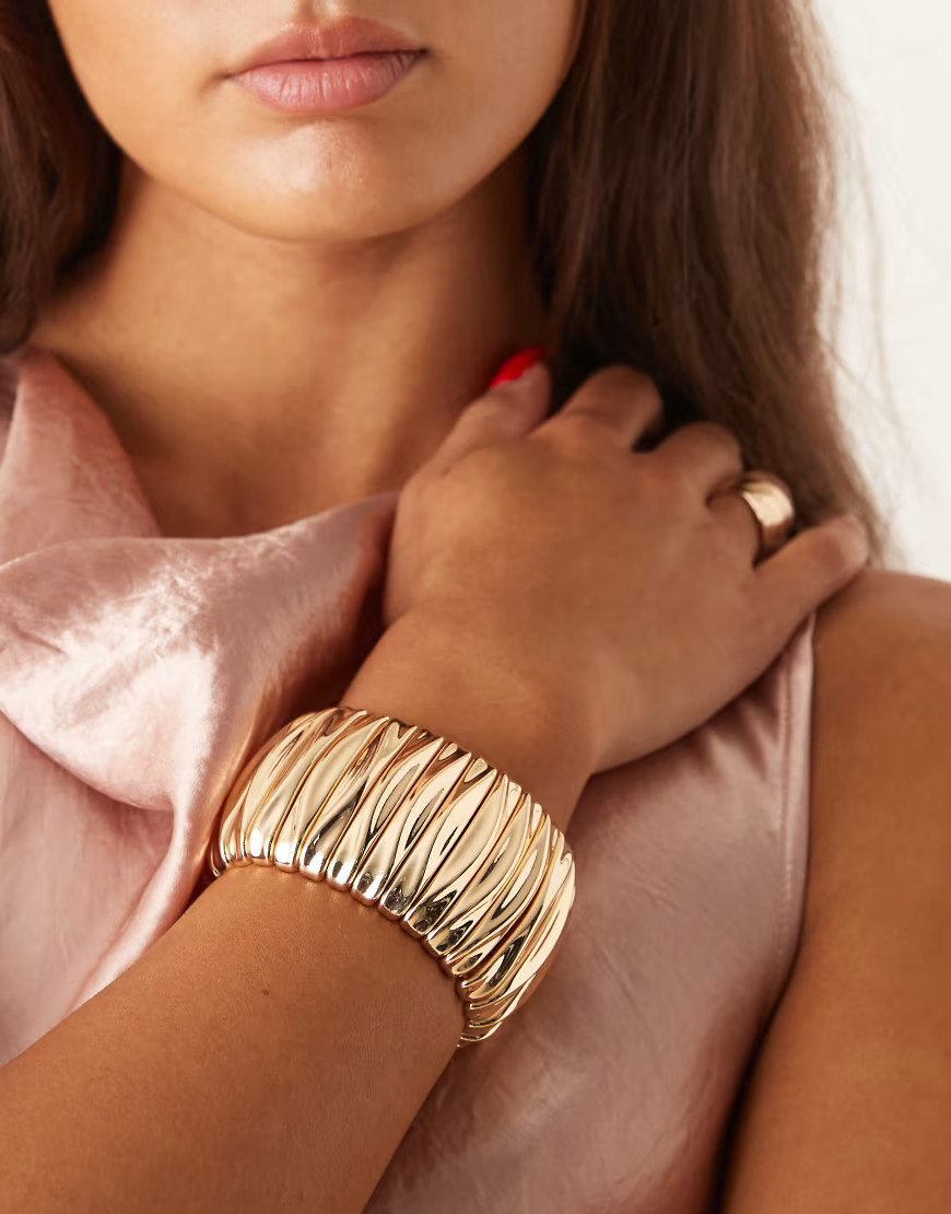 ASOS DESIGN chunky stretch bracelet in gold tone | ASOS (Global)