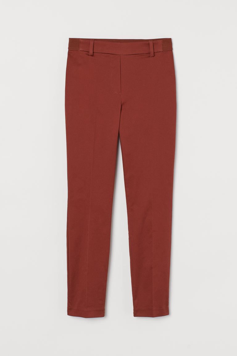Slacks in woven stretch fabric. Regular waist, elastication at back of waistband, and mock welt p... | H&M (US + CA)