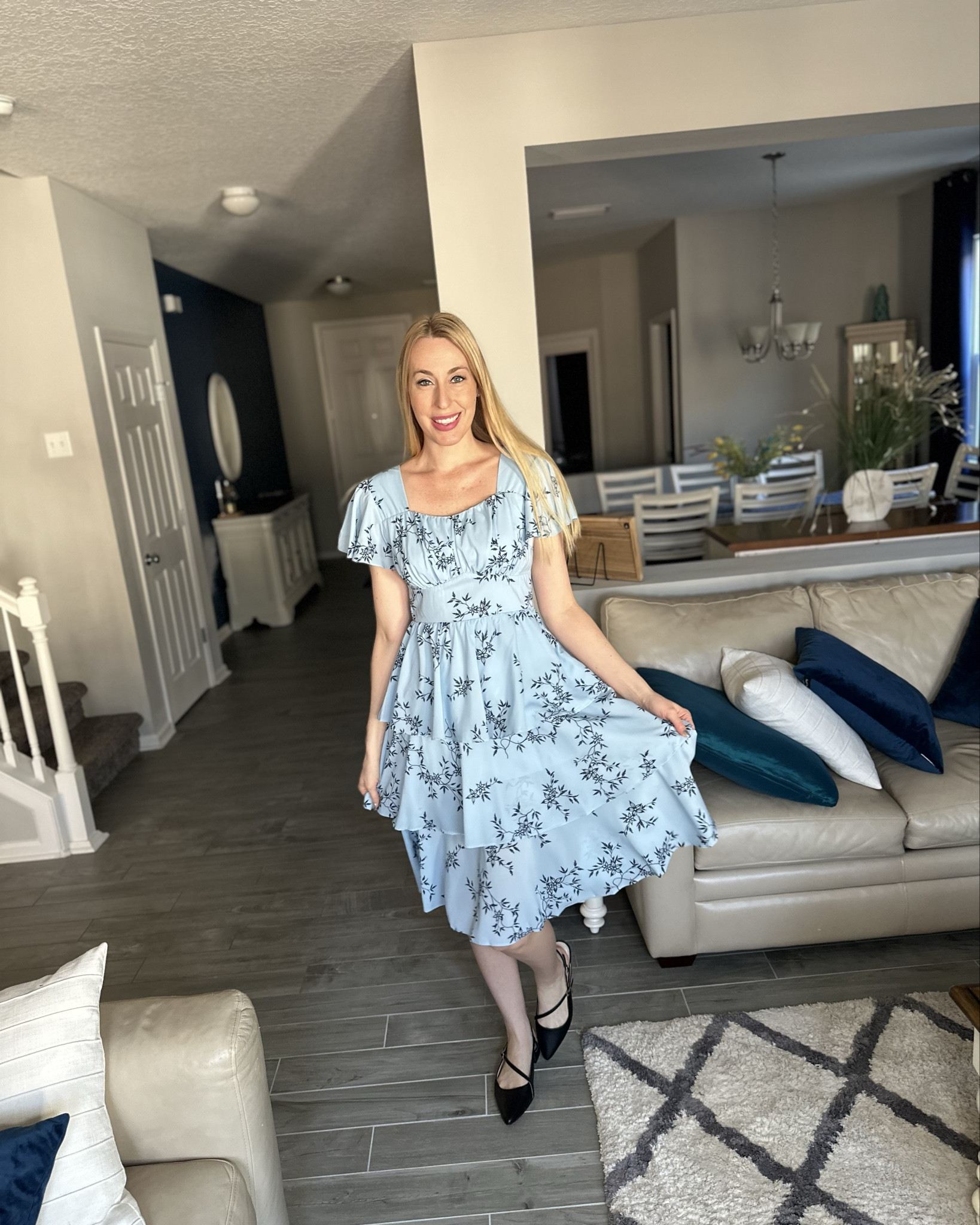 Blue floral spring tiered dress
💙 I love the feminine design and structure of this dress
💙  the top is more fitted and bottom more flowy, fits true to size  
💙 wearing size small, I am 5’10”


#LTKFindsUnder50 #LTKStyleTip #LTKFindsUnder100