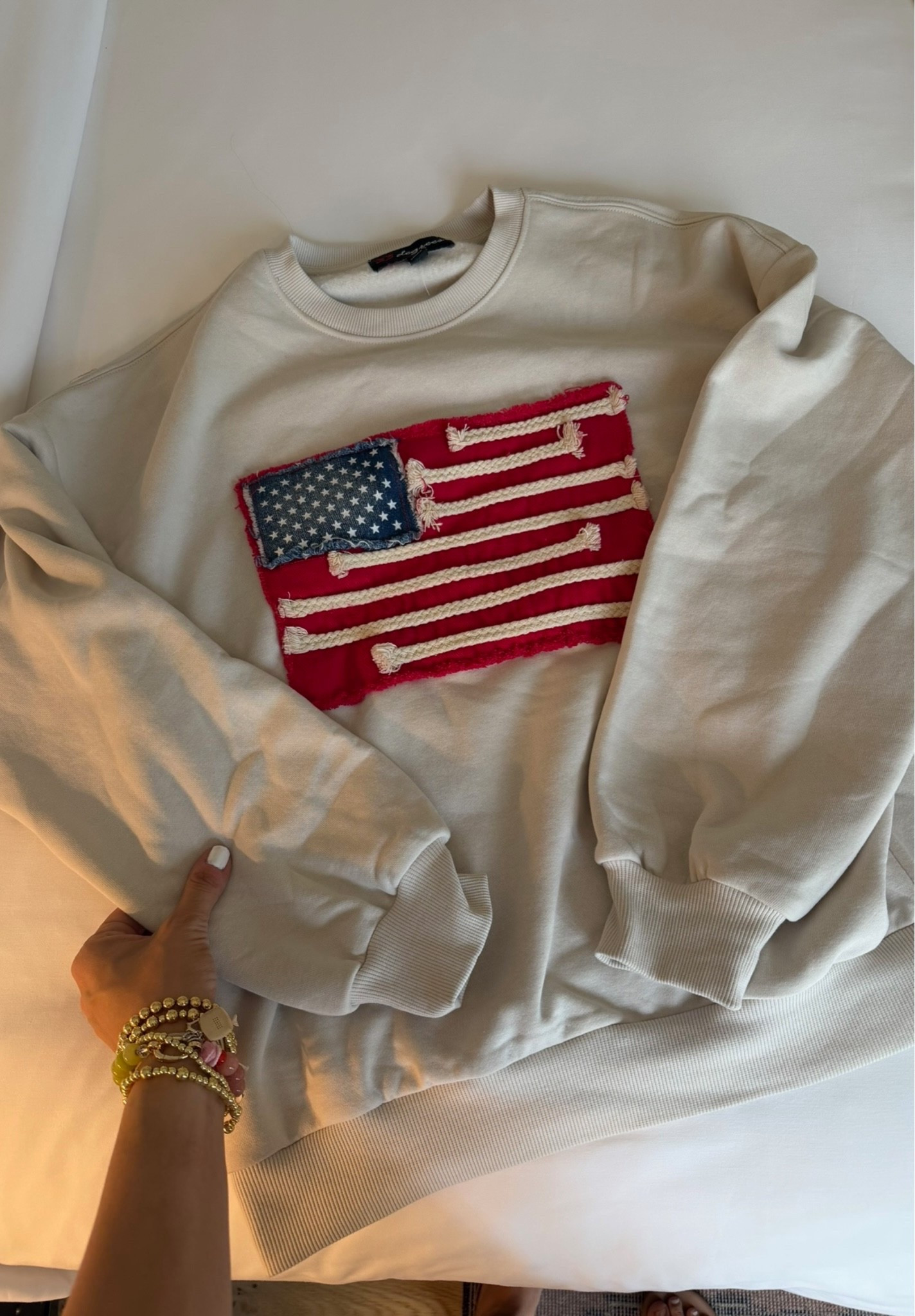 How cute is this sweatshirt for Memorial Day Weekend?! 🇺🇸 Pair it with jean shorts and you’re good to go

#LTKootd #LTKSwim #LTKgrwm