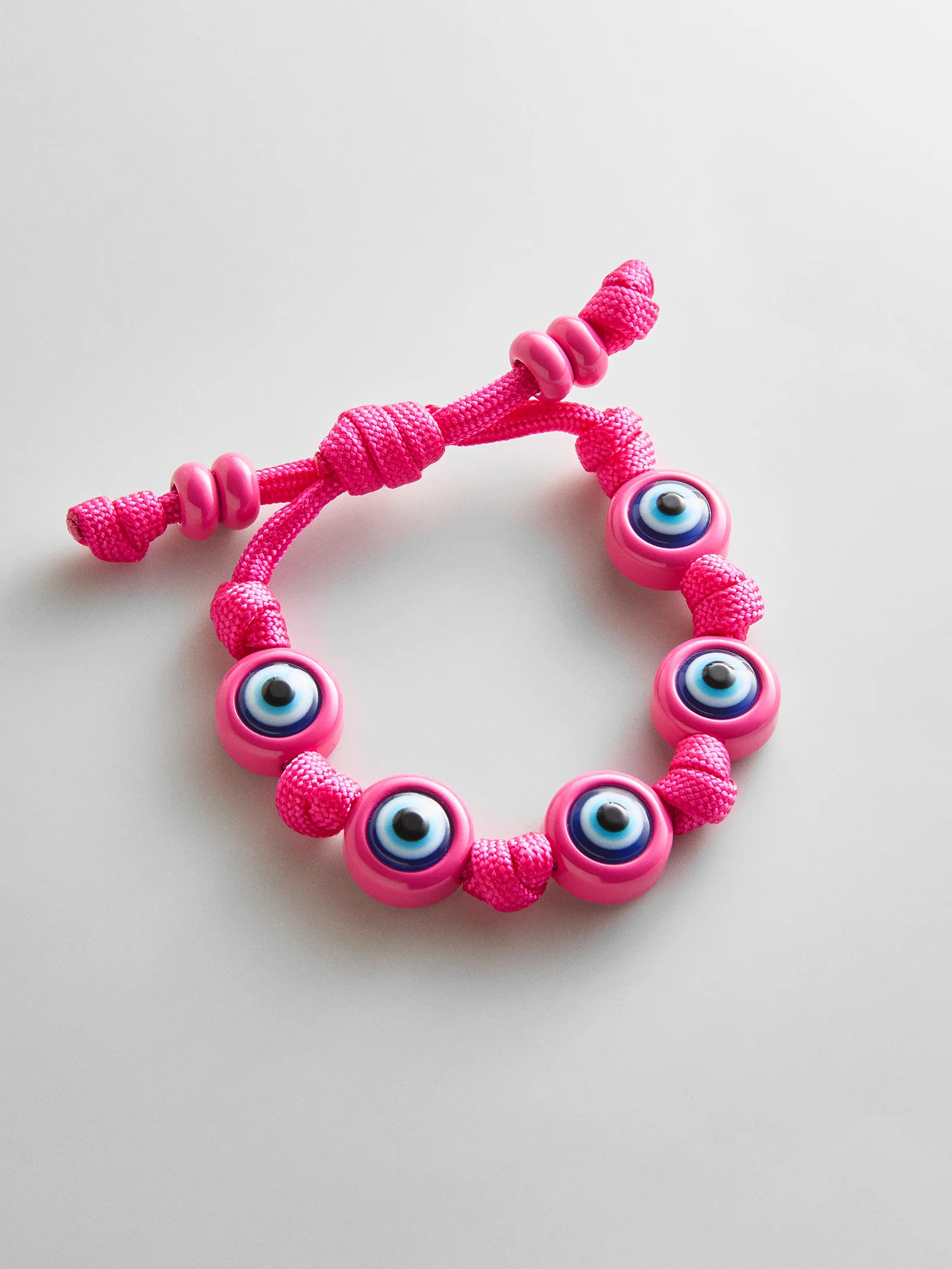 Knotty Good Eye Cord Bracelet  - Fuchsia | BaubleBar