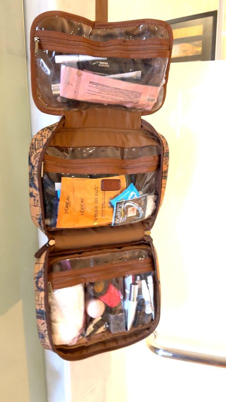 This versatile hanging travel case is built travel tough for your toiletries, jewelry, and other small items. Water-resistant, nothing seeps in or spills out. Designed for convenience, hang it by the hook or lay it out flat. Zip pockets for your delicate items and transparent pockets for organization make this an easy choice.

#LTKItBag #LTKFindsUnder100 #LTKTravel