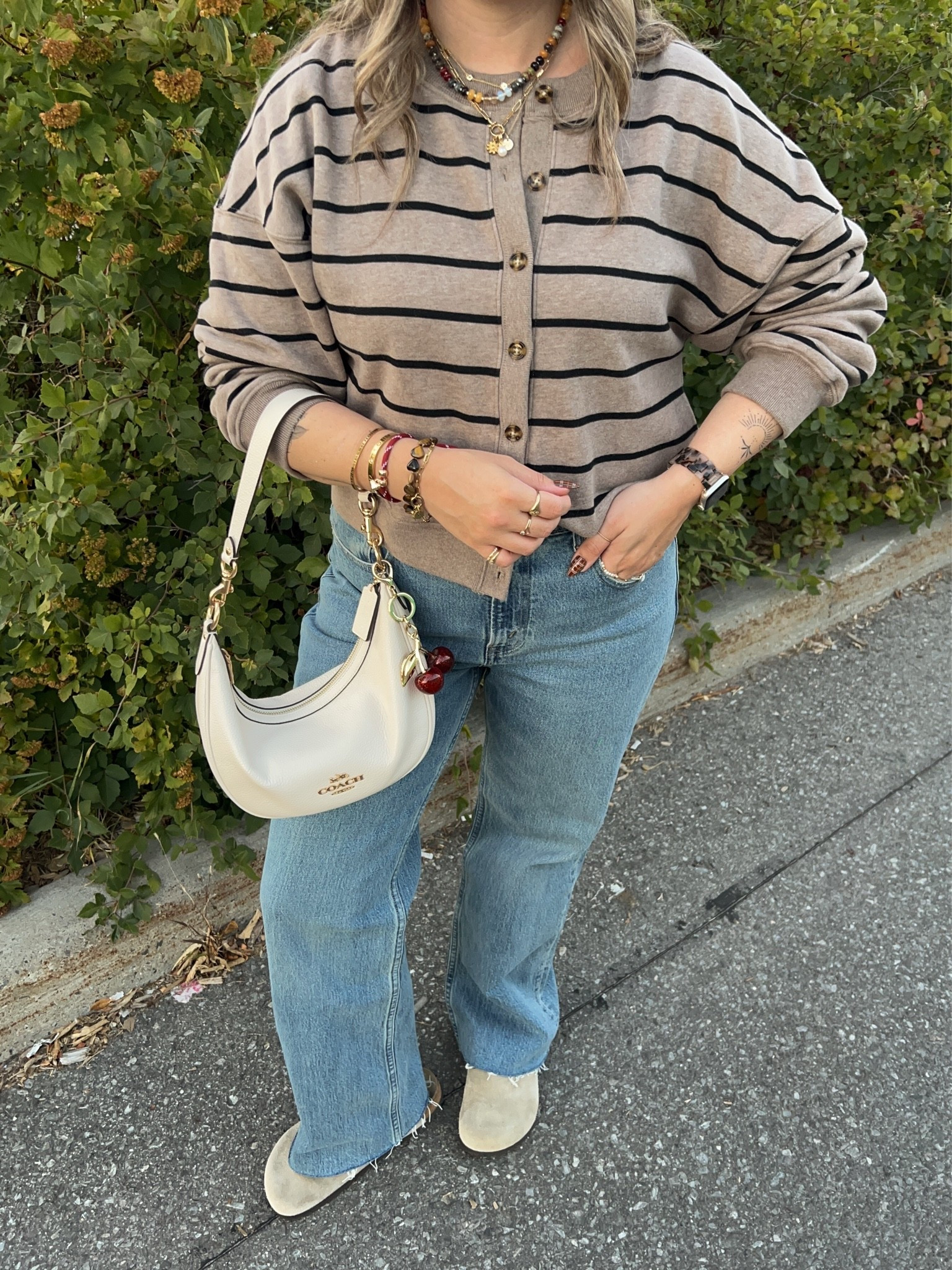 Casual fall outfit! Wearing L in the striped sweatshirt cardigan and 30 in the jeans. I’m a 9.5-10 shoe and wear a 40 in the Birkenstock clogs

#LTKfall #LTKjeans #LTKstyletip